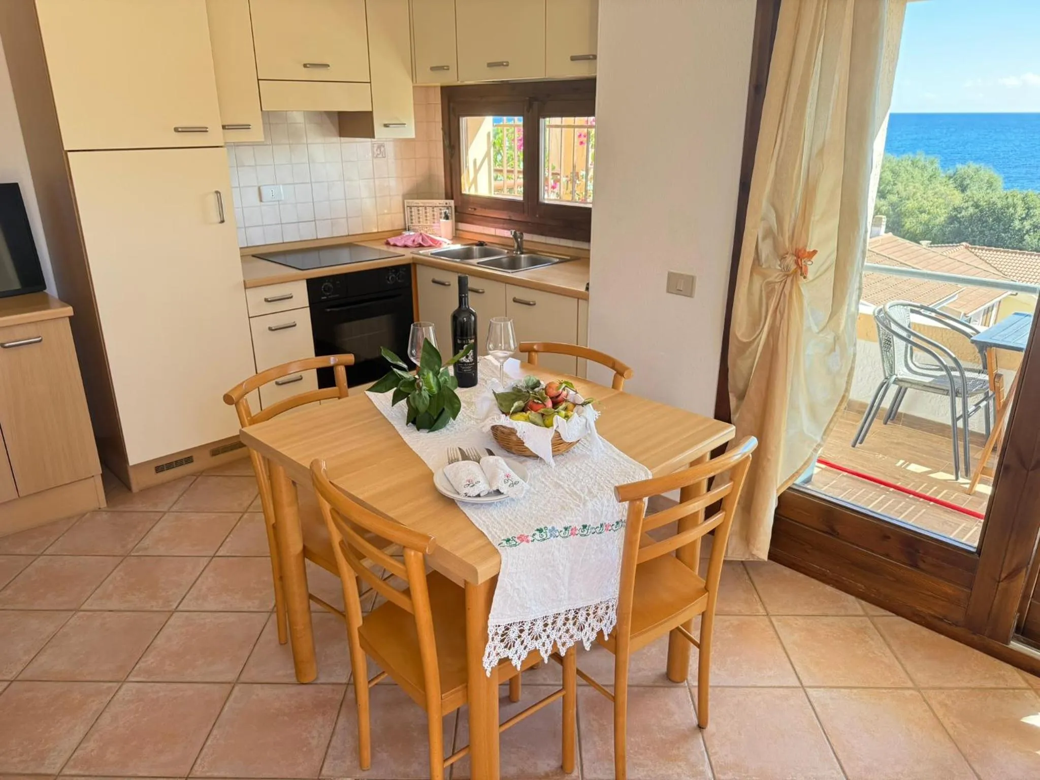 Dining area in Residence Il Borgo di Porto Corallo