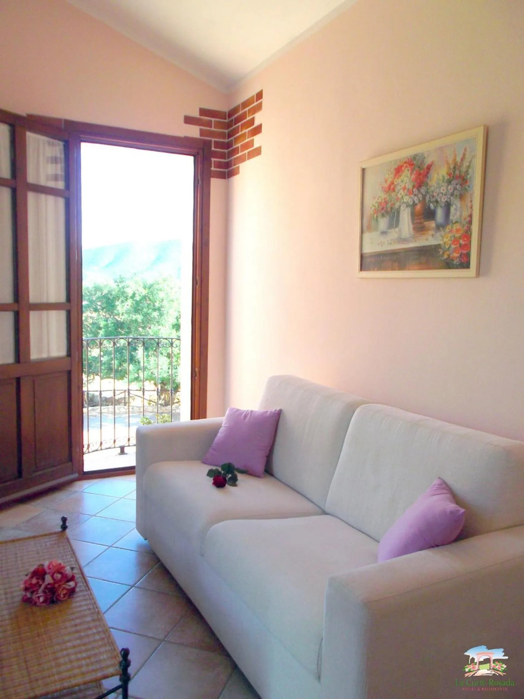 Living room in Hotel La Corte Rosada