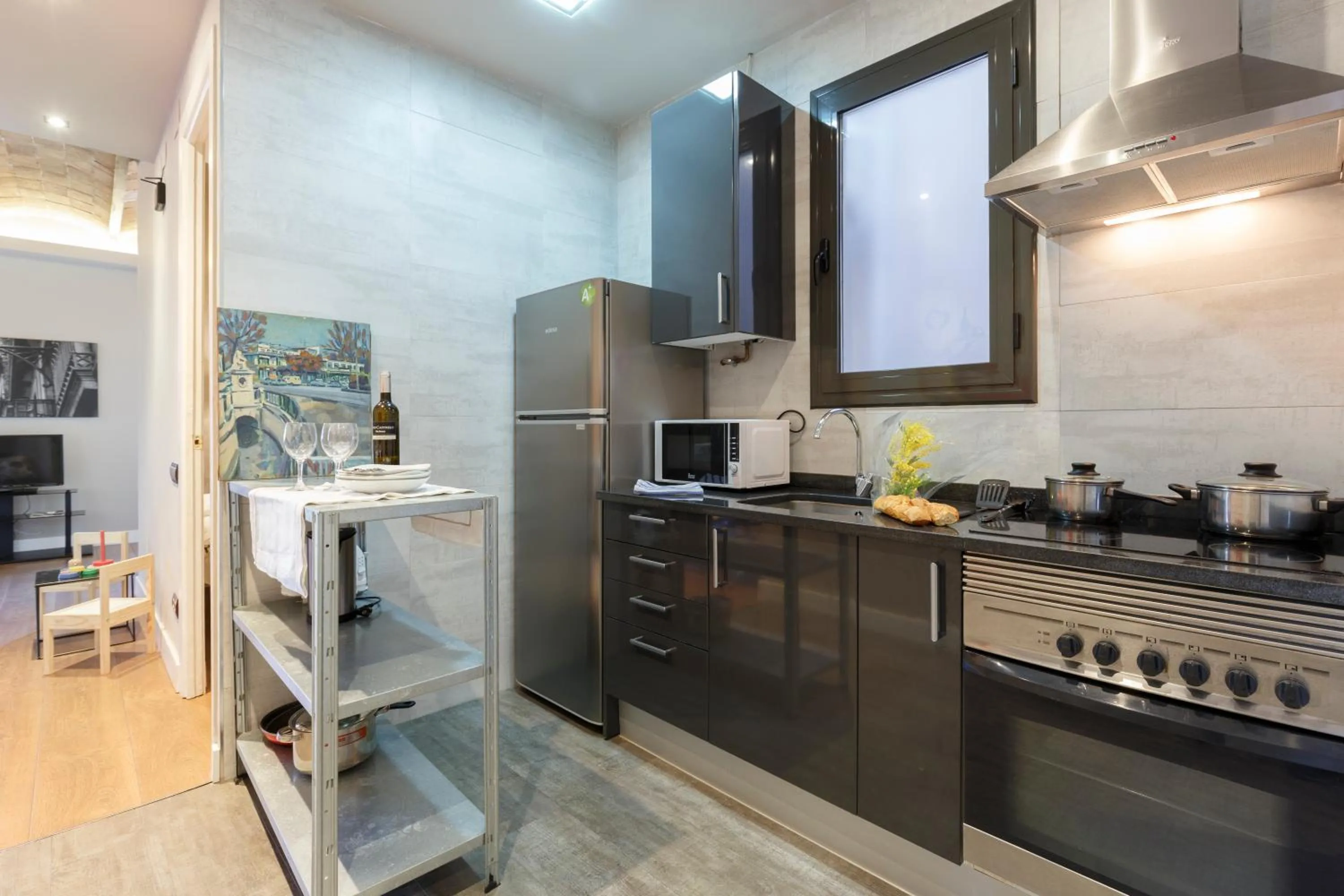 Kitchen or kitchenette in AinB Eixample-Miro Apartments