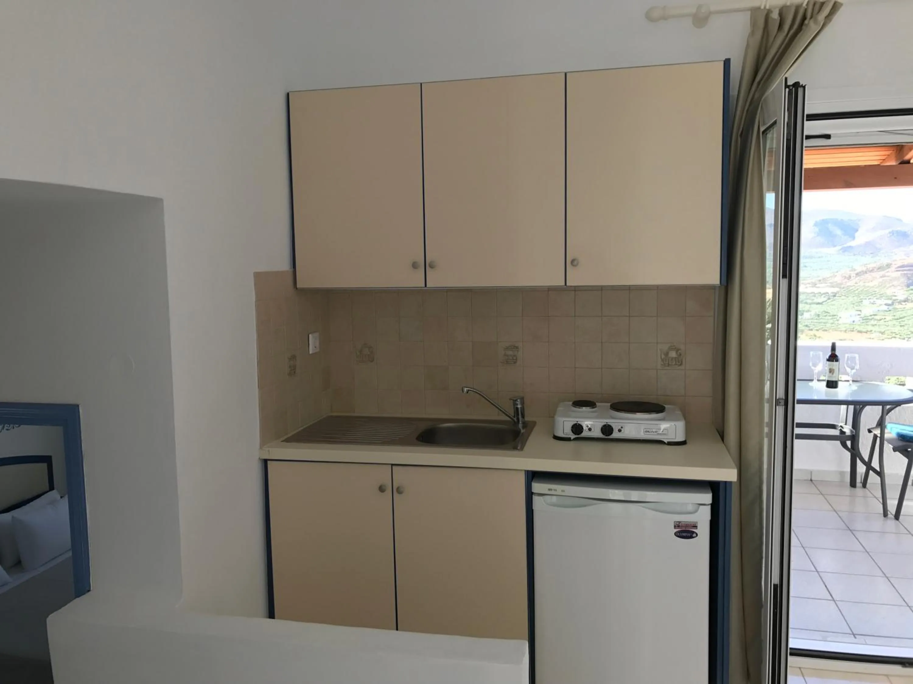 Kitchen or kitchenette in Castri Village Hotel