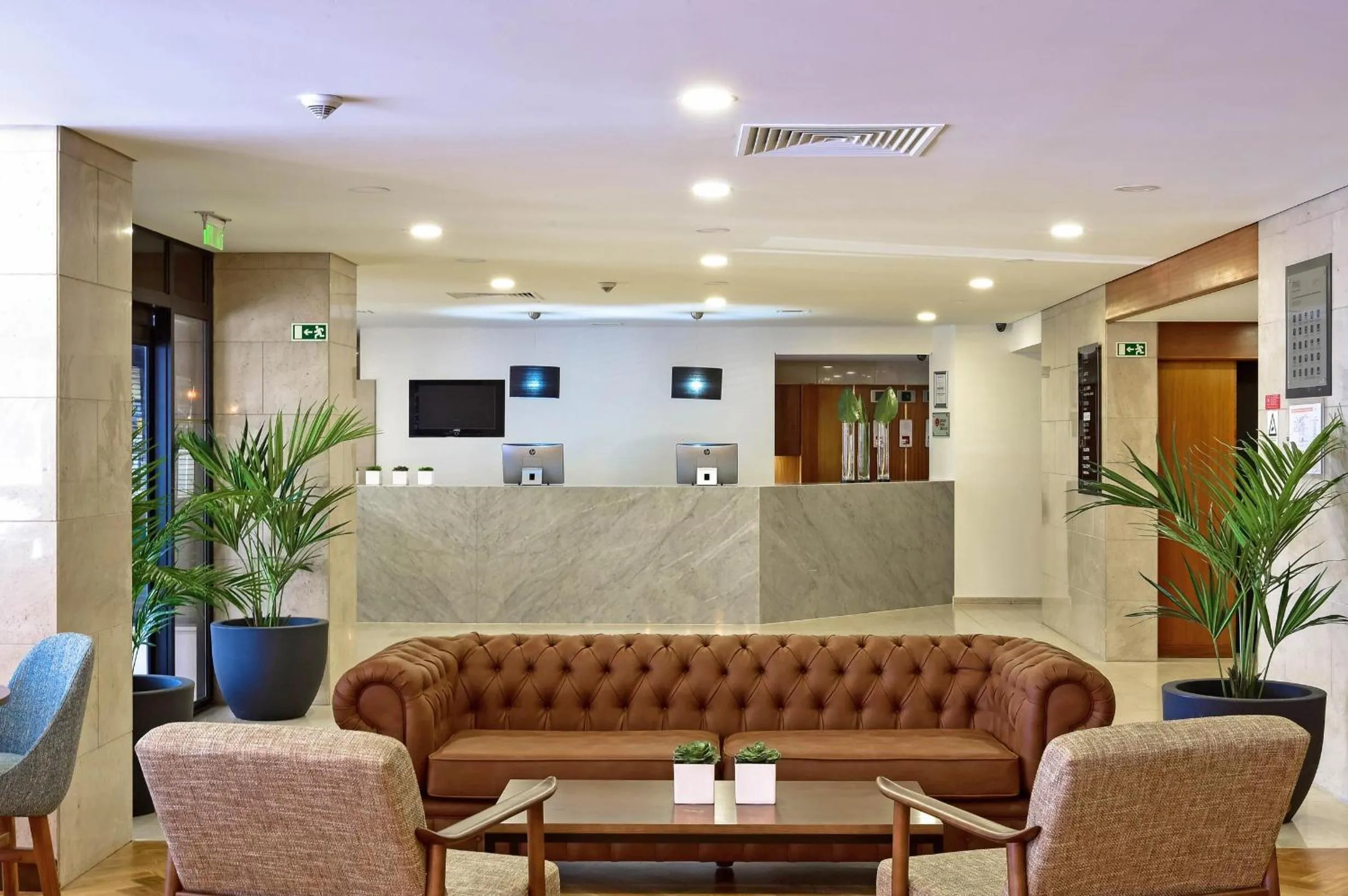 Lobby or reception in Tivoli Coimbra Hotel