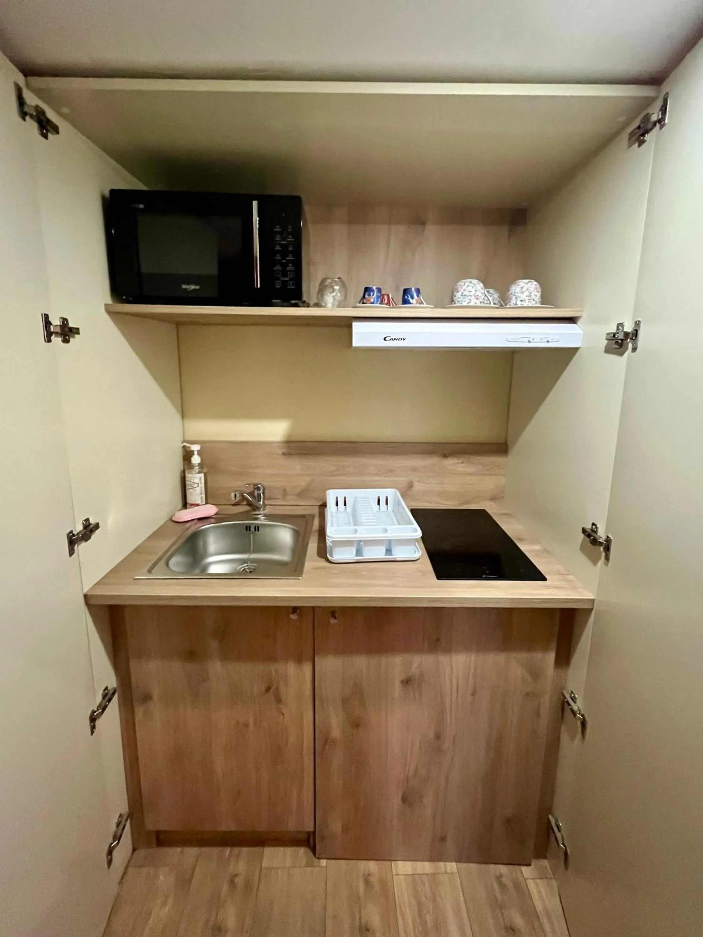 Kitchen or kitchenette in Le Clos Violette et Le 11 D'Aglaé - Appart' Hôtel de Charme Design de Luxe