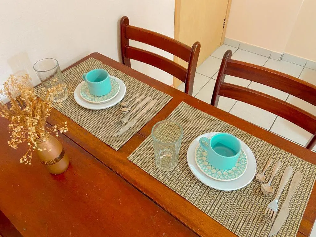 Dining area in Apto lindo e aconchegante com piscina 202A