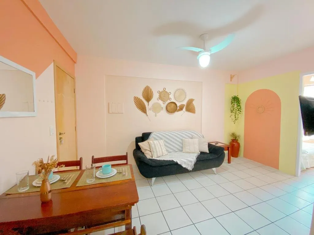 Living room in Apto lindo e aconchegante com piscina 202A