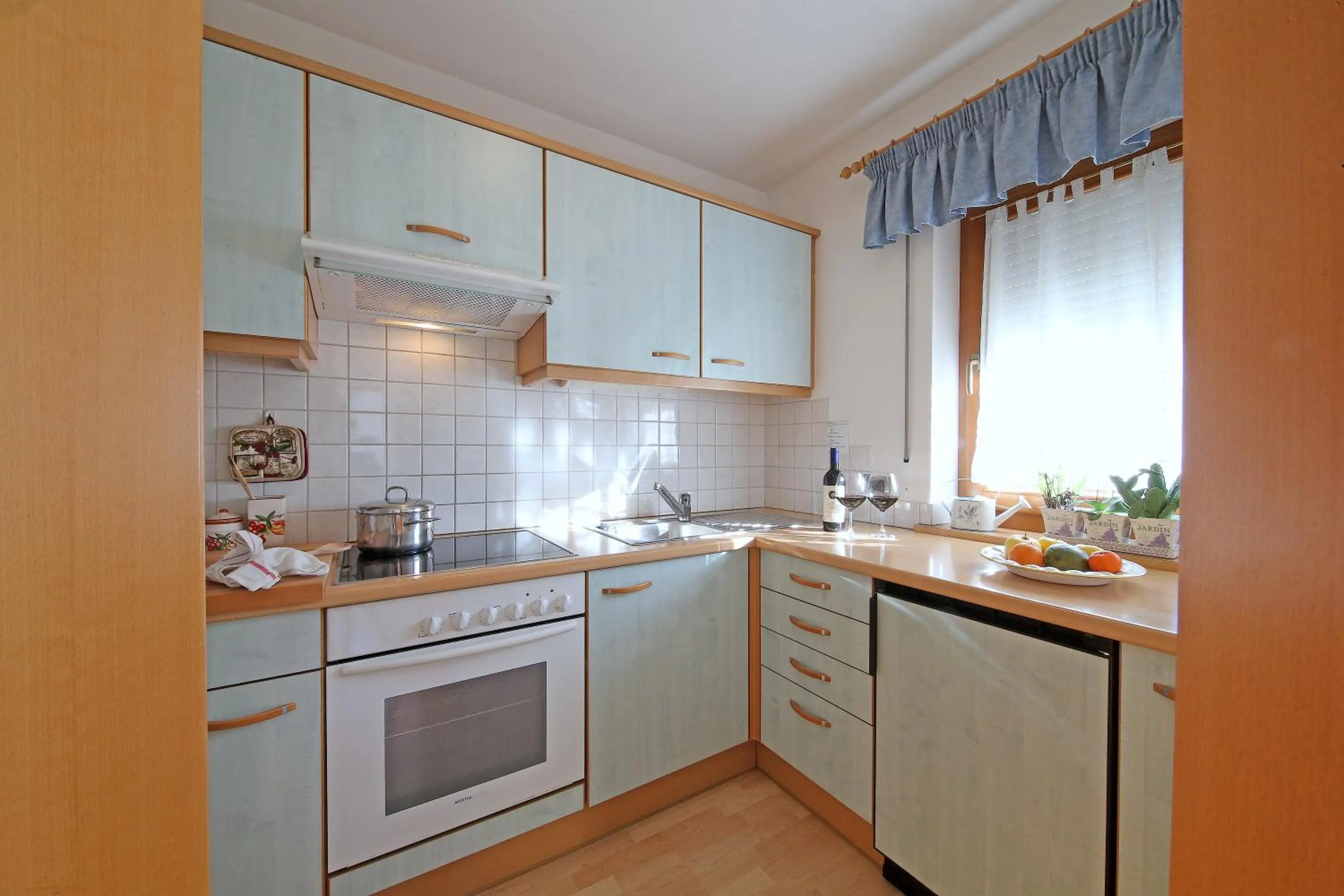 Kitchen or kitchenette in Ciasa Rudiferia Appartamenti in Alta Badia