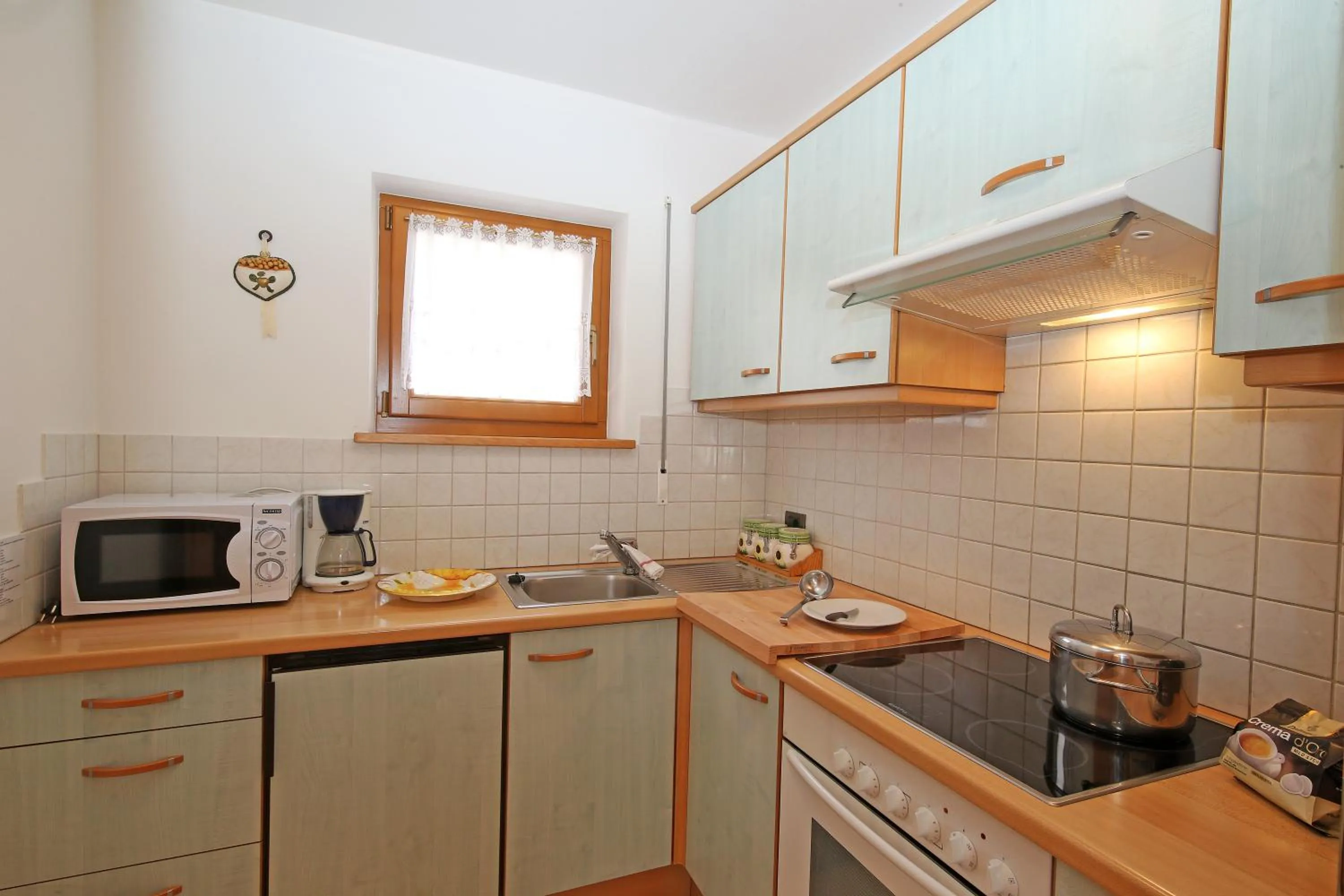 Kitchen or kitchenette in Ciasa Rudiferia Appartamenti in Alta Badia