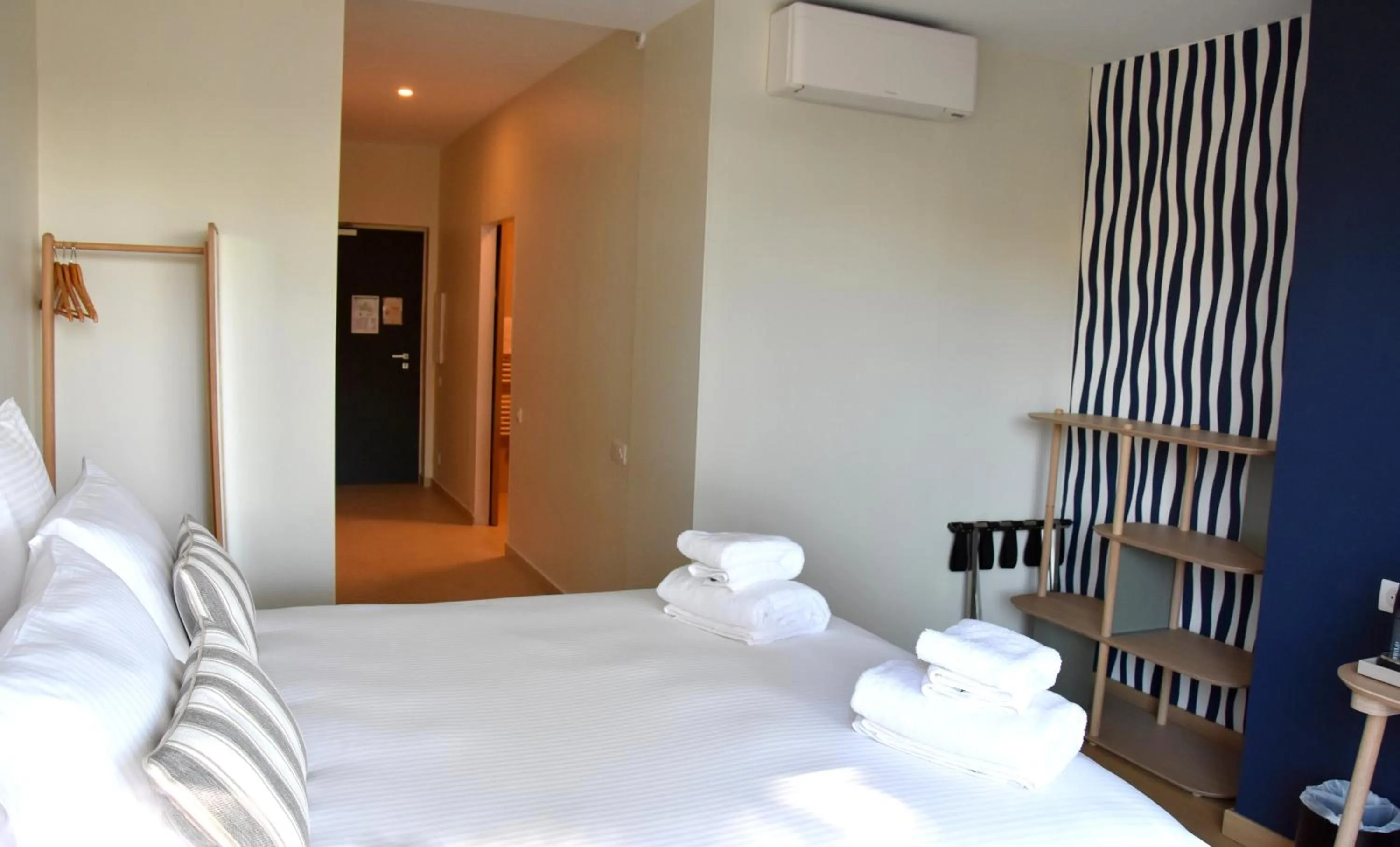 Bed in LOGIS Hotel Restaurant Le KALLISTE