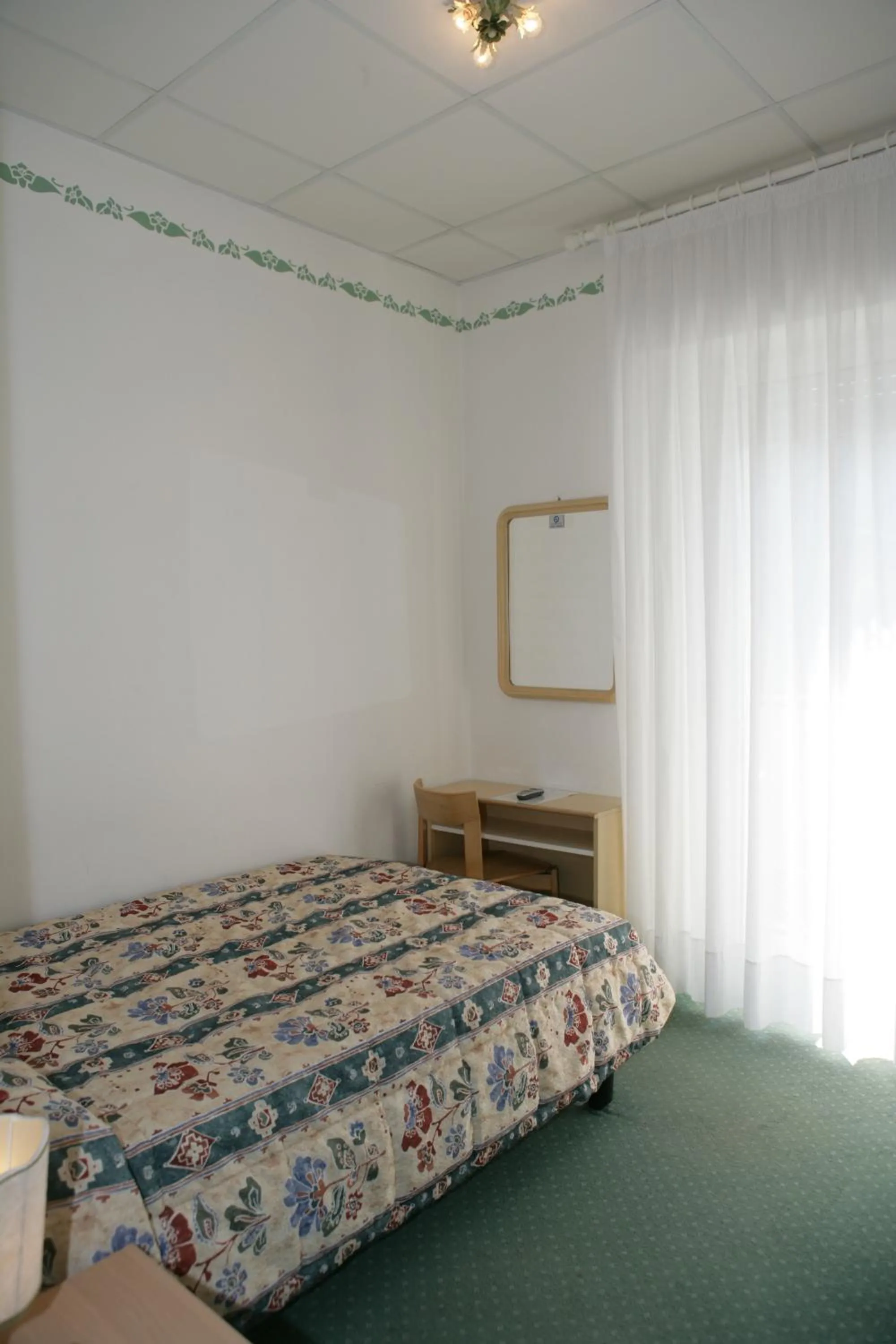 Bed in Hotel Villa Rosa