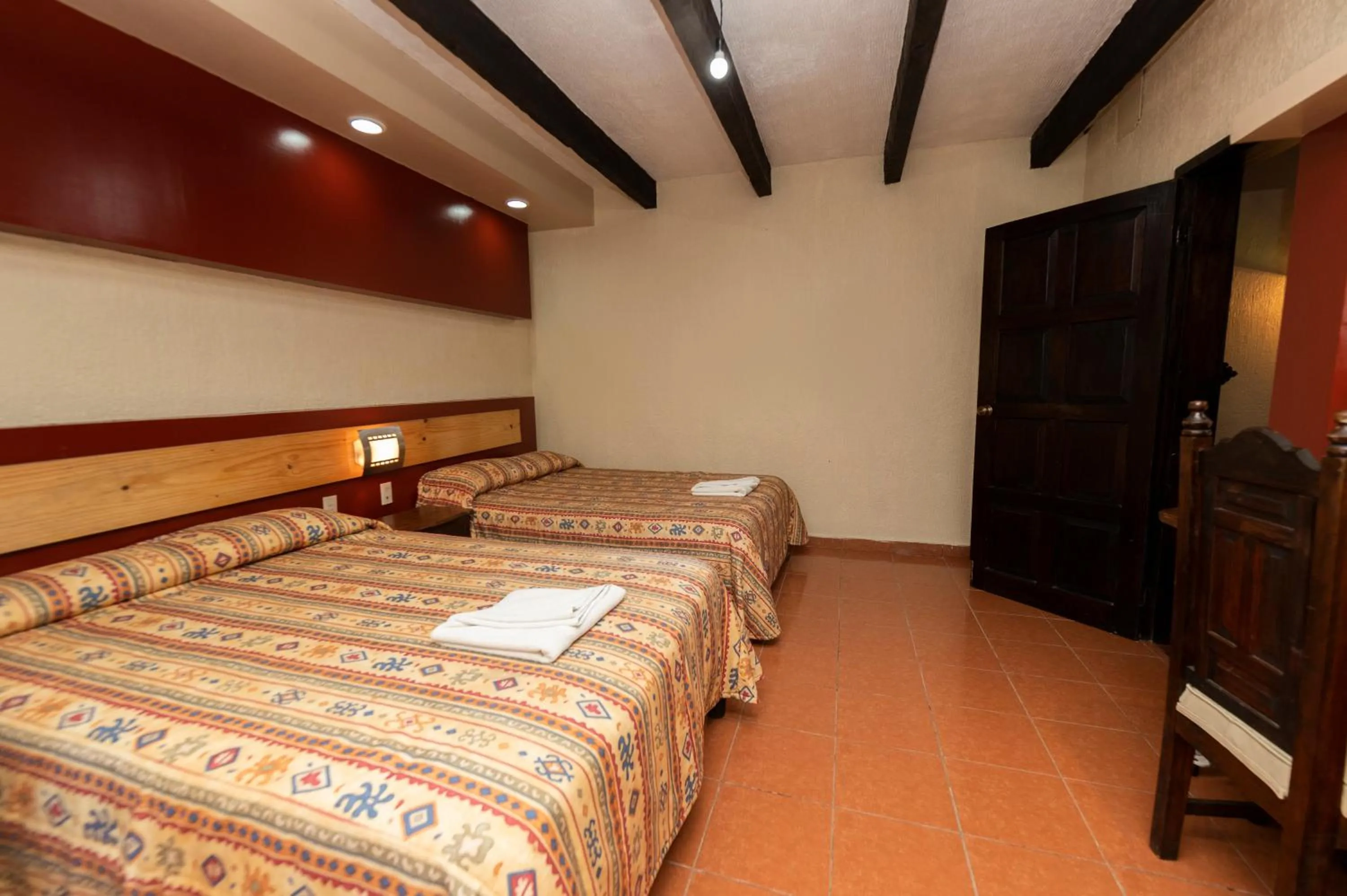 Bed in Hotel Y Villas Vanessa