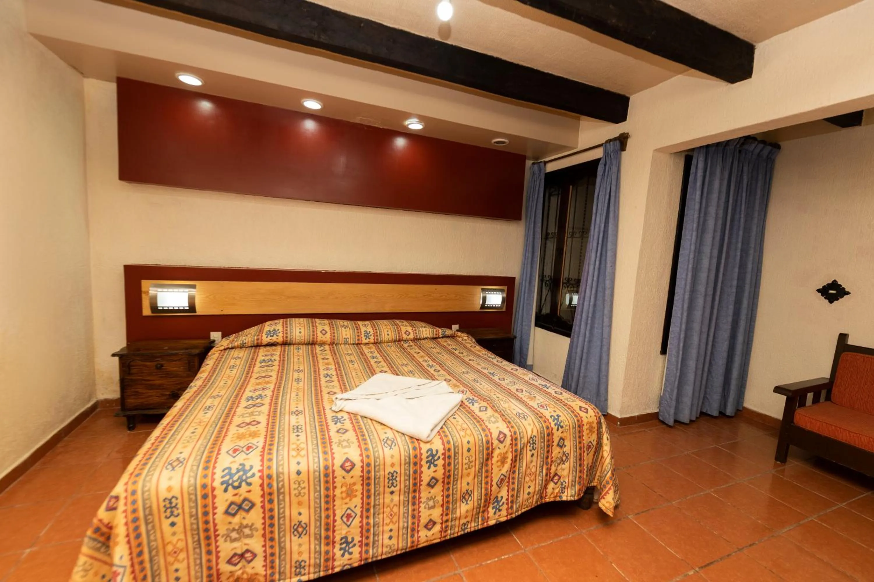 Bed in Hotel Y Villas Vanessa