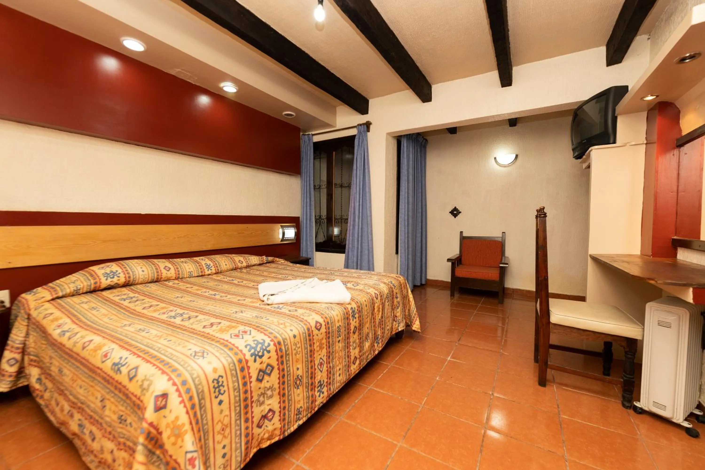 Bed in Hotel Y Villas Vanessa