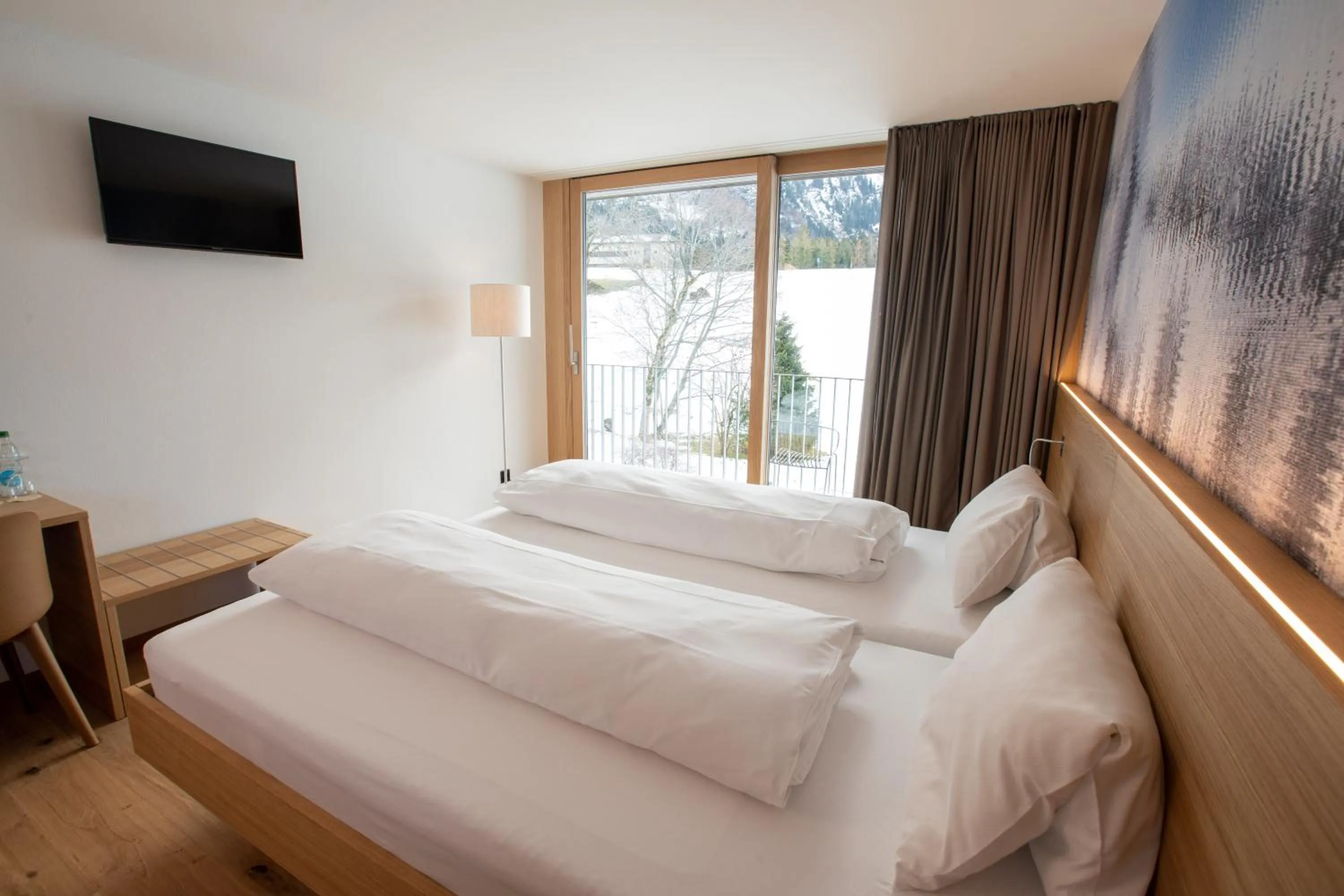 Bed in Hotel Stump's Alpenrose