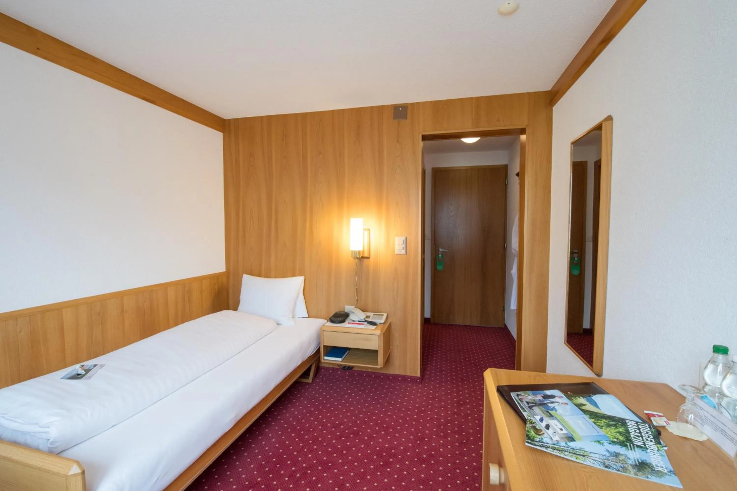 Bed in Hotel Stump's Alpenrose