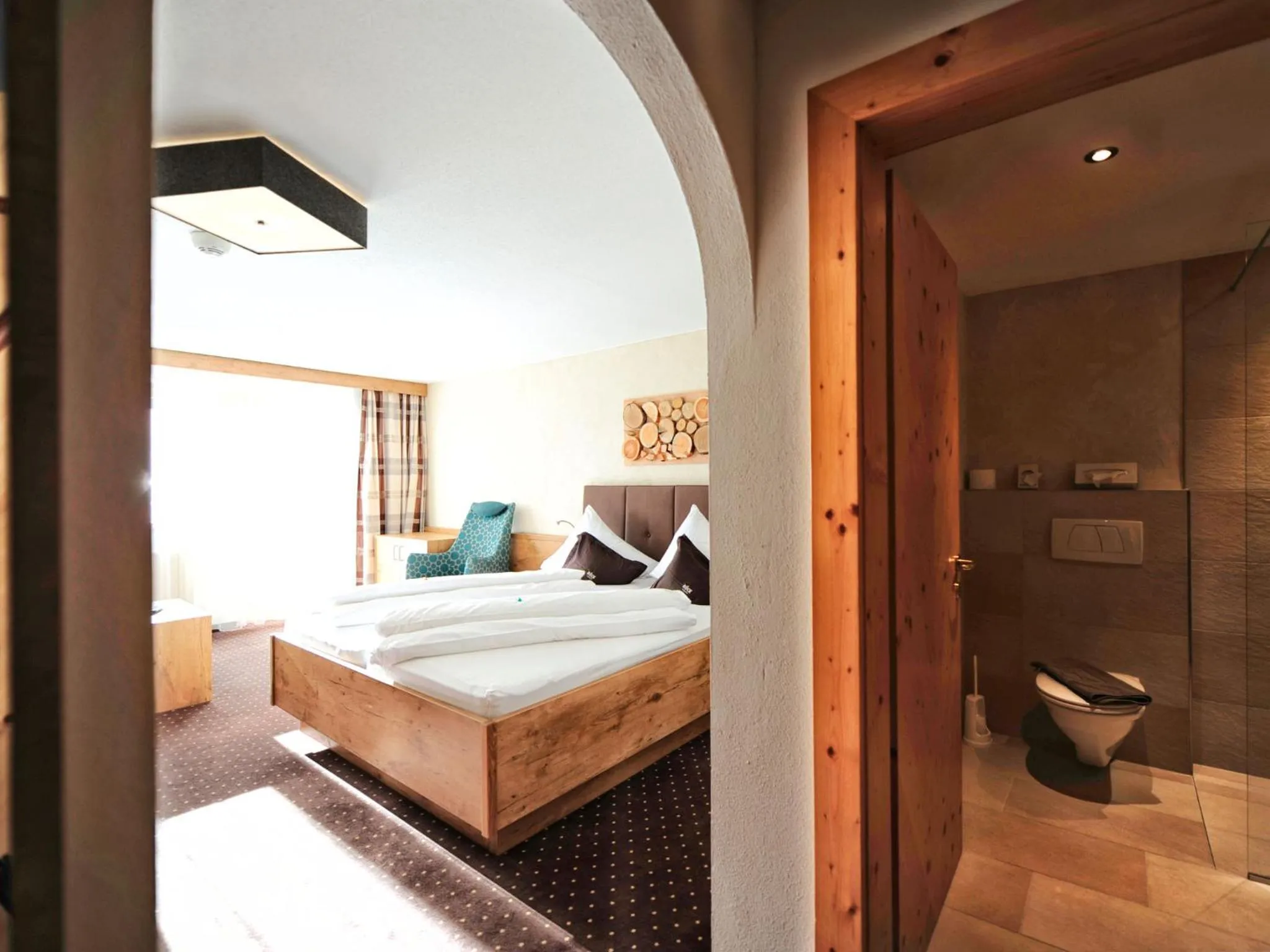 Bed in Hotel Röck Garni