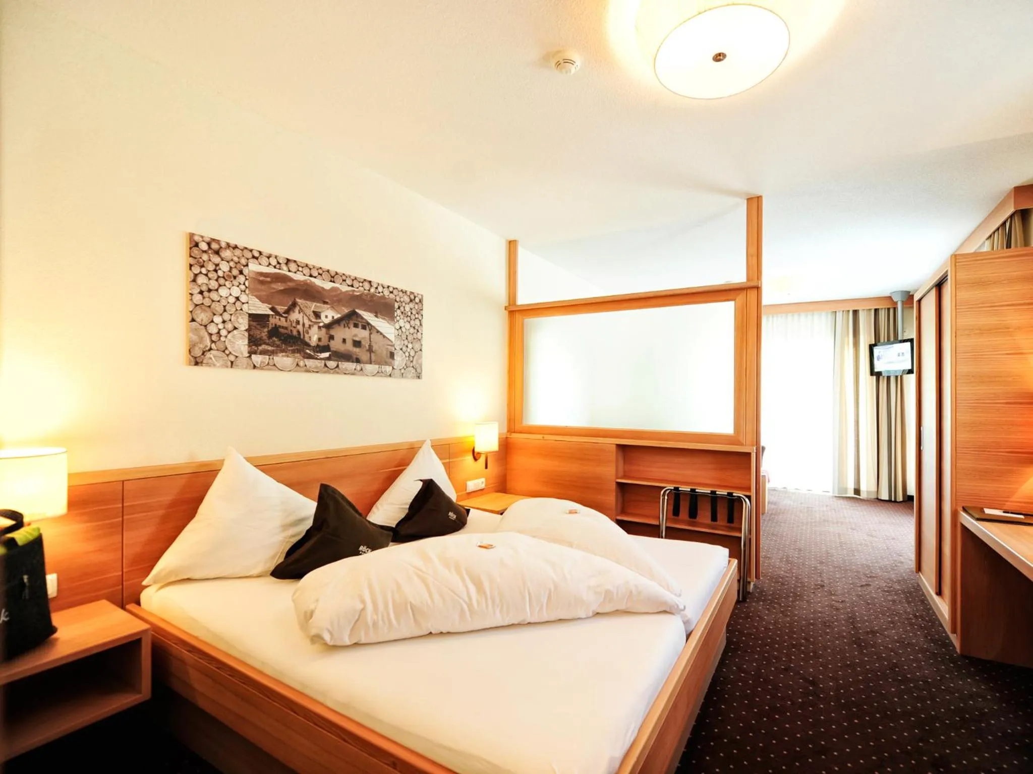 Bed in Hotel Röck Garni