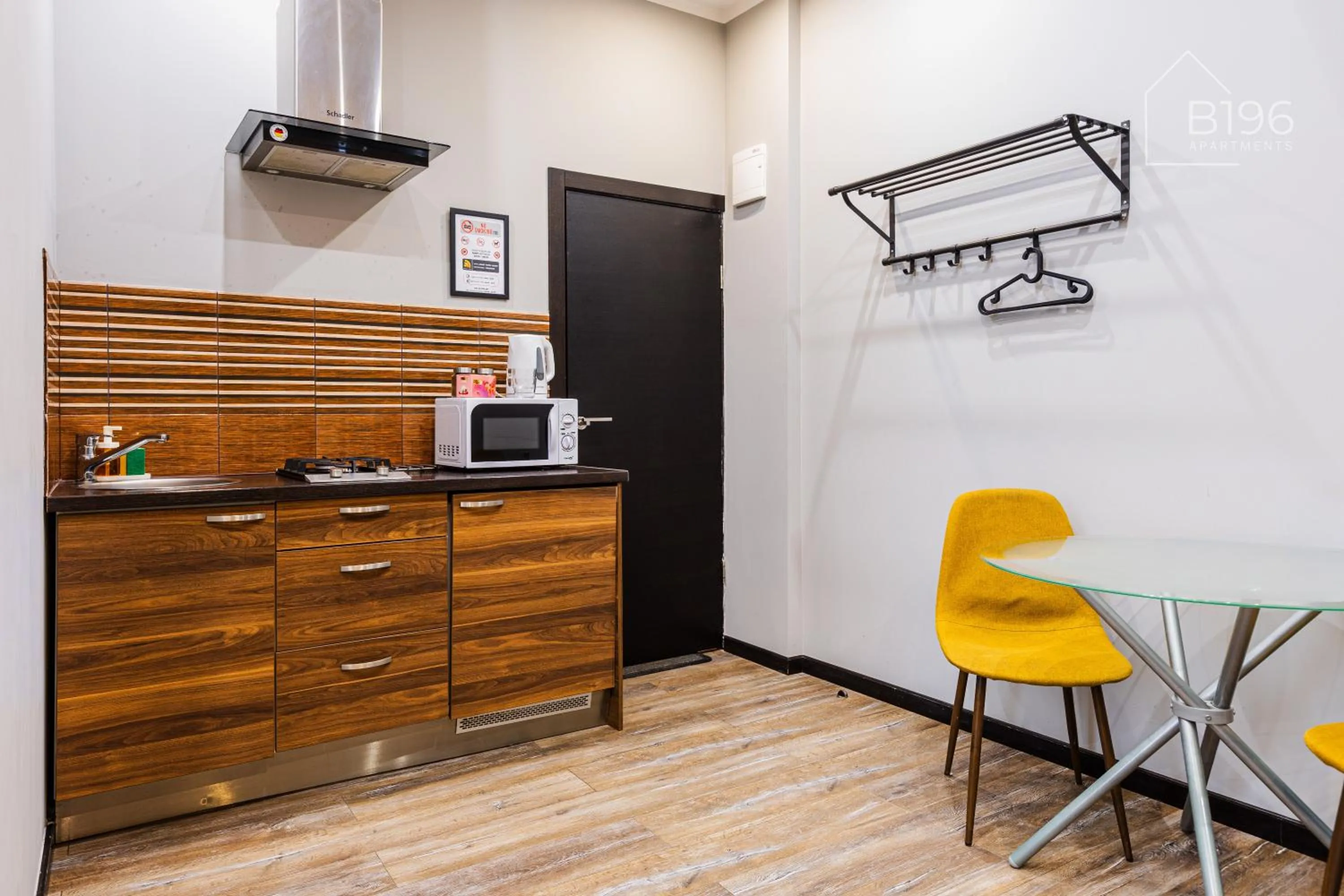 kitchen in ApartHotel Riga