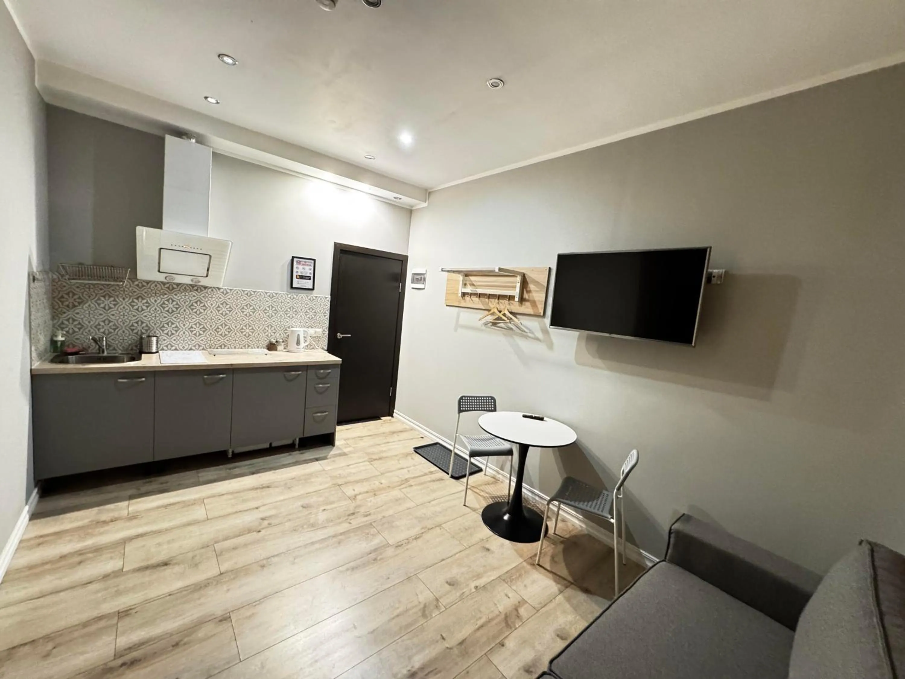 Kitchen or kitchenette in ApartHotel Riga