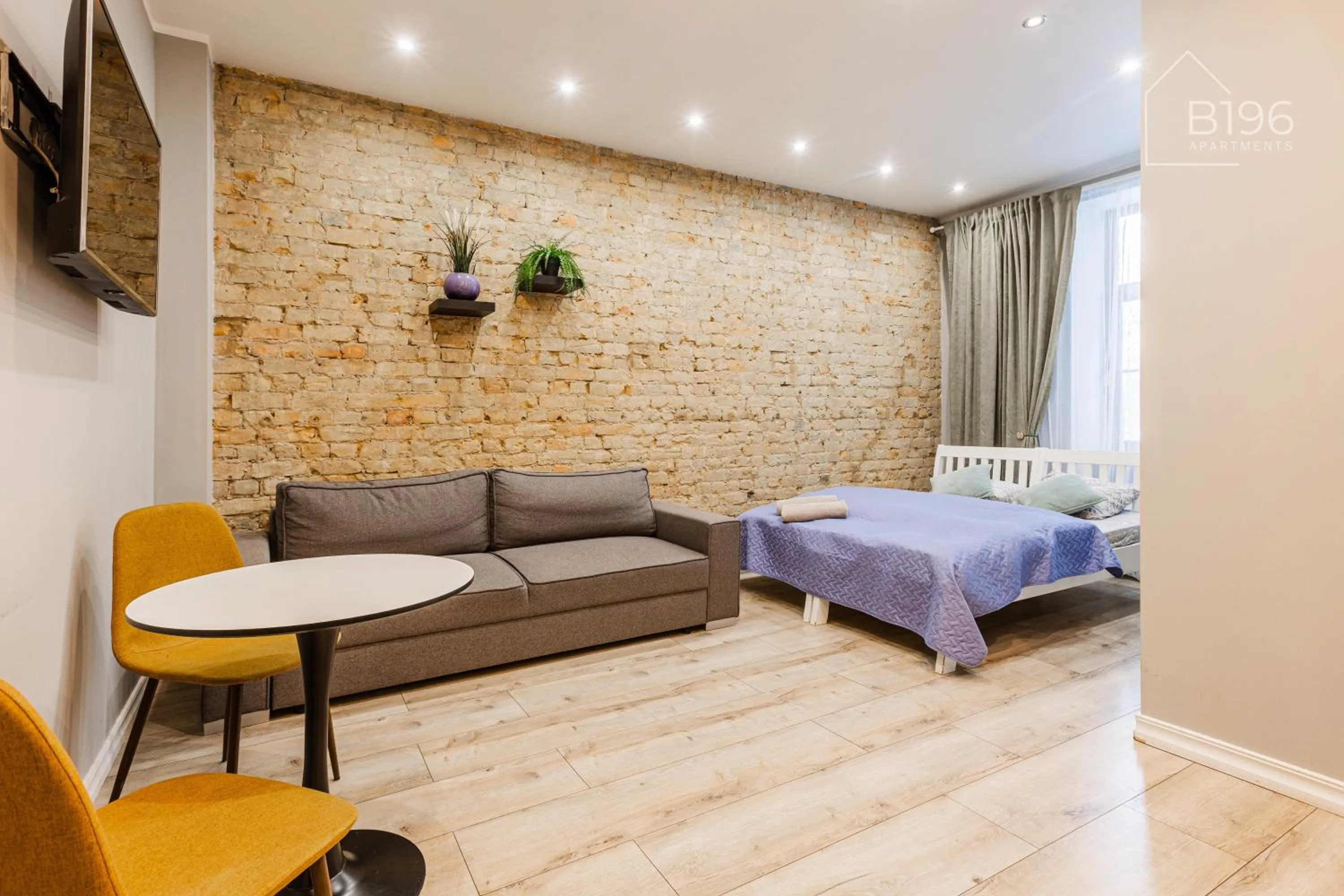 Photo of the whole room, Bed in ApartHotel Riga