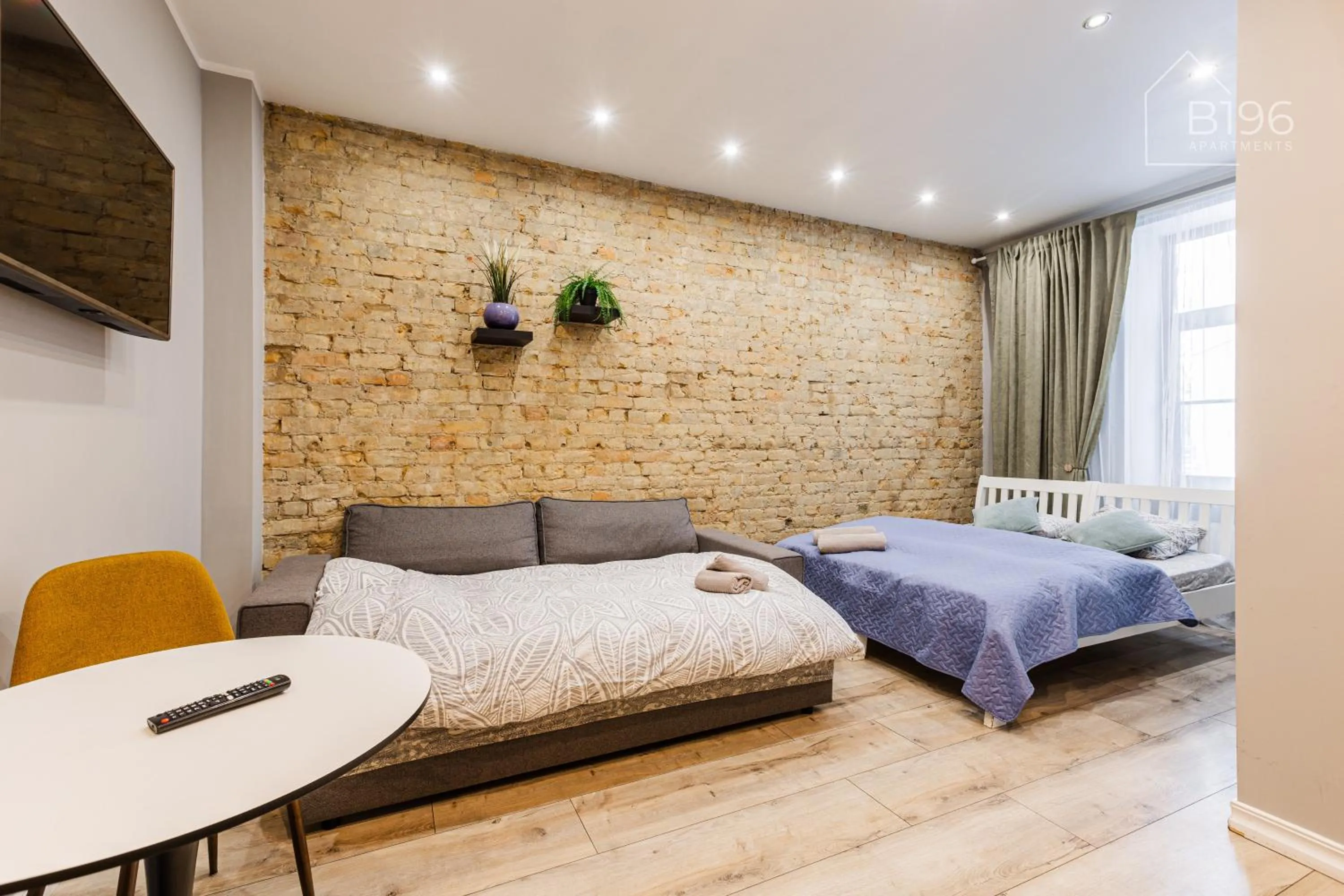 Photo of the whole room, Bed in ApartHotel Riga