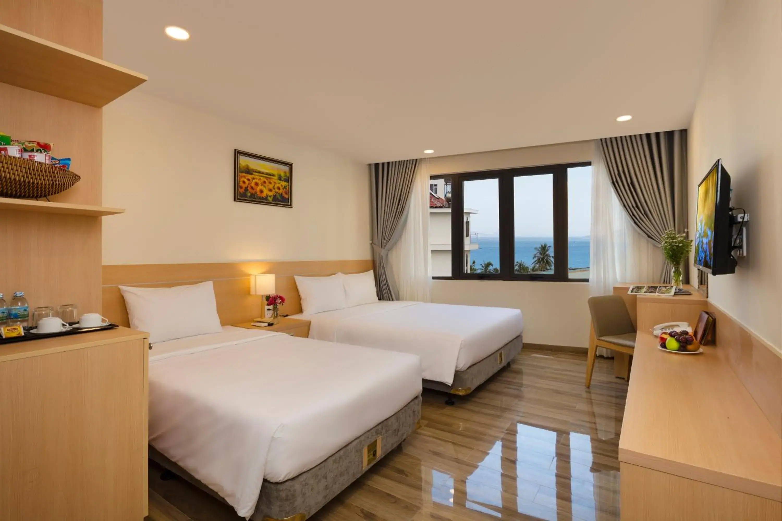 Deluxe Triple Room with Sea View in The Swan Nha Trang Hotel Deluxe Triple Room with Sea View in The Swan Nha Trang Hotel