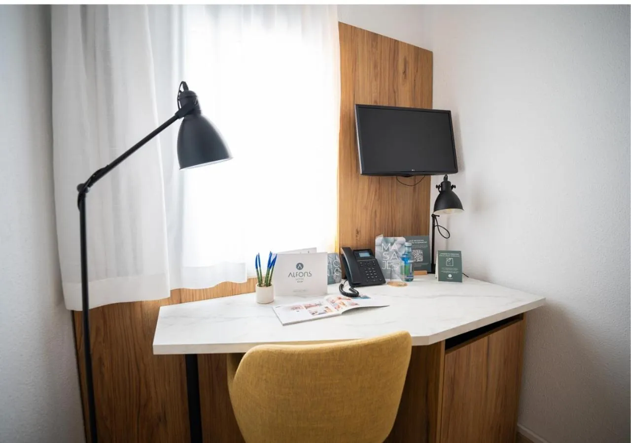 Bedroom in Alfons Hotel