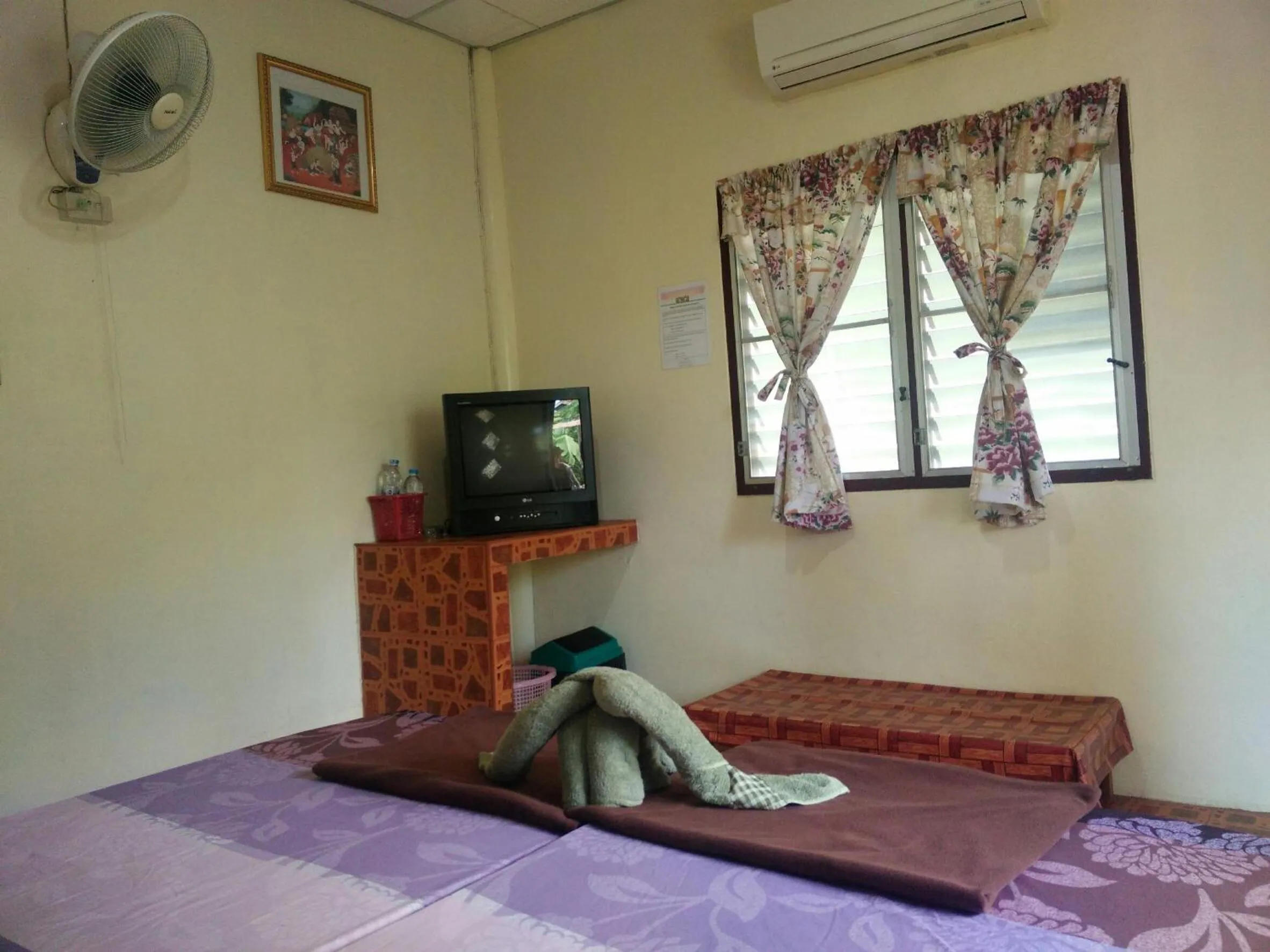 Bed in Day Night Bangalows