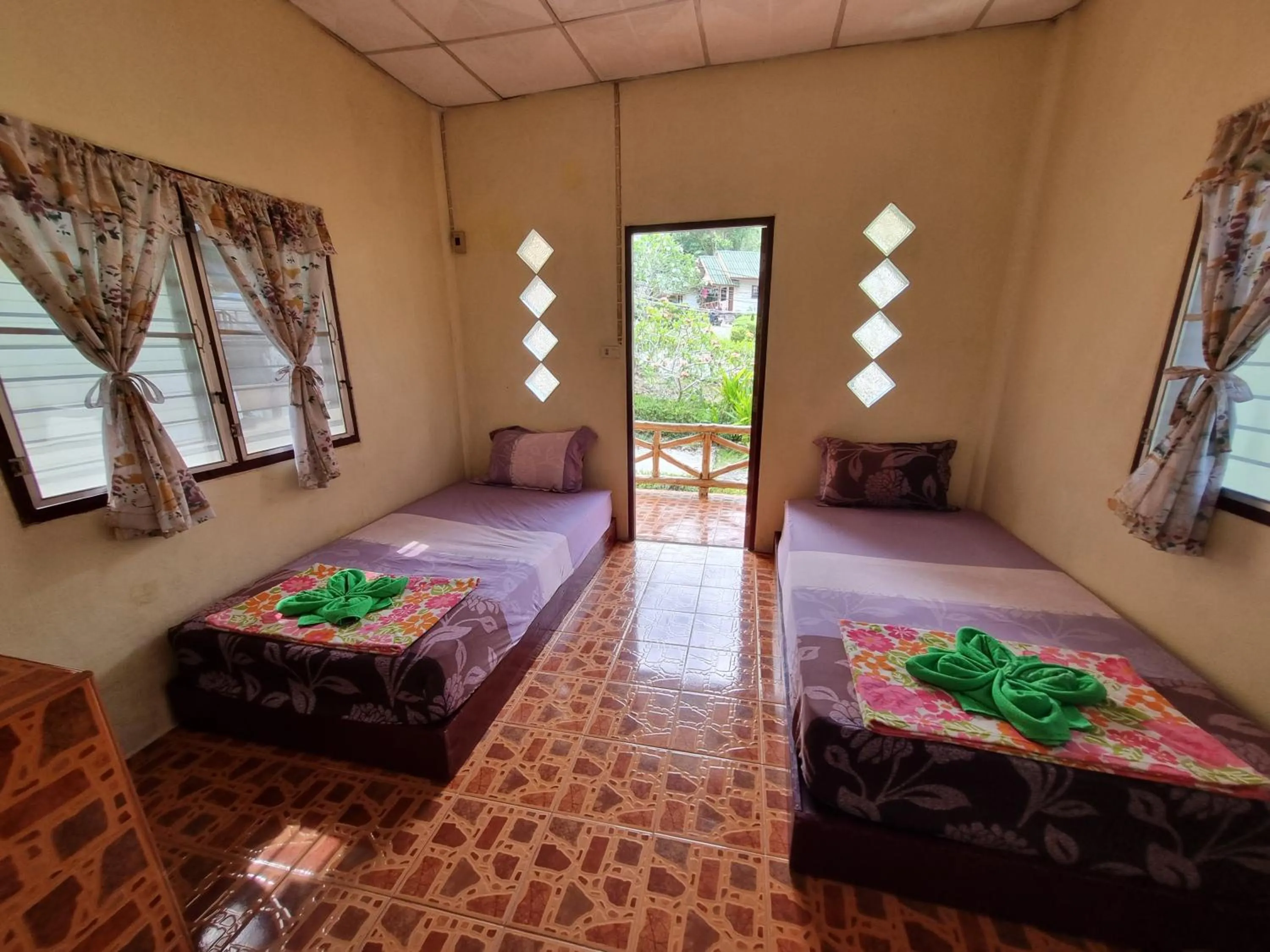 Bed in Day Night Bangalows