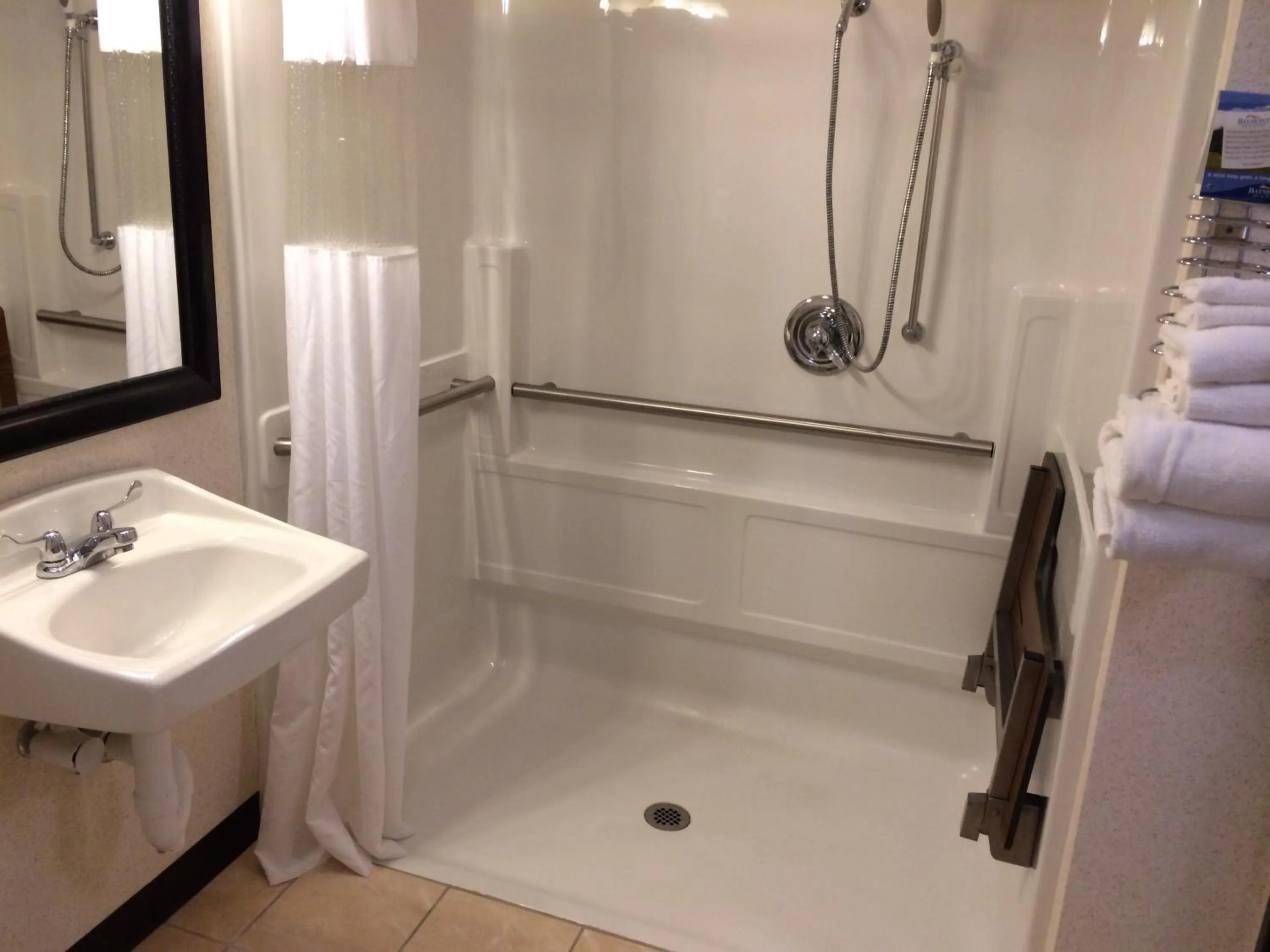 Shower in Baymont by Wyndham Pella