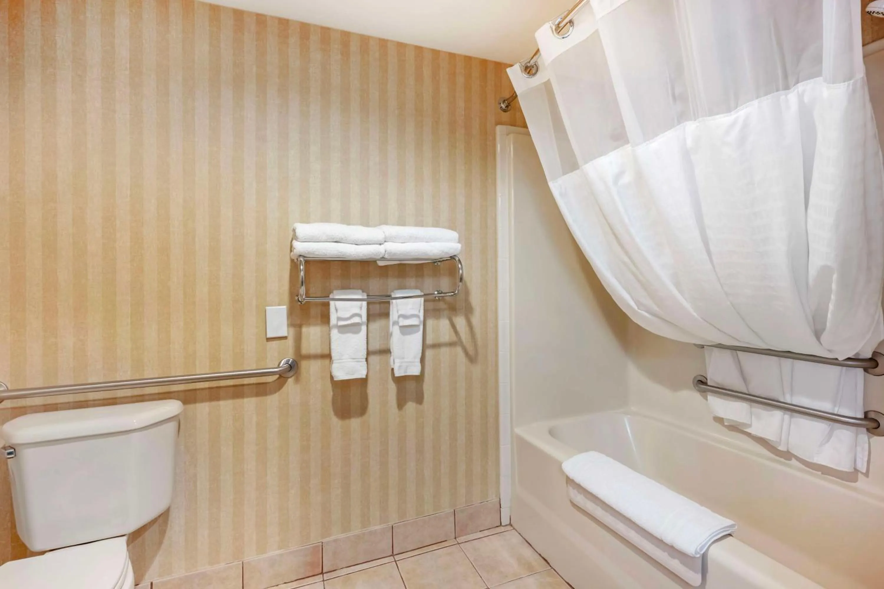 Bathroom in SureStay Plus by Best Western Enterprise