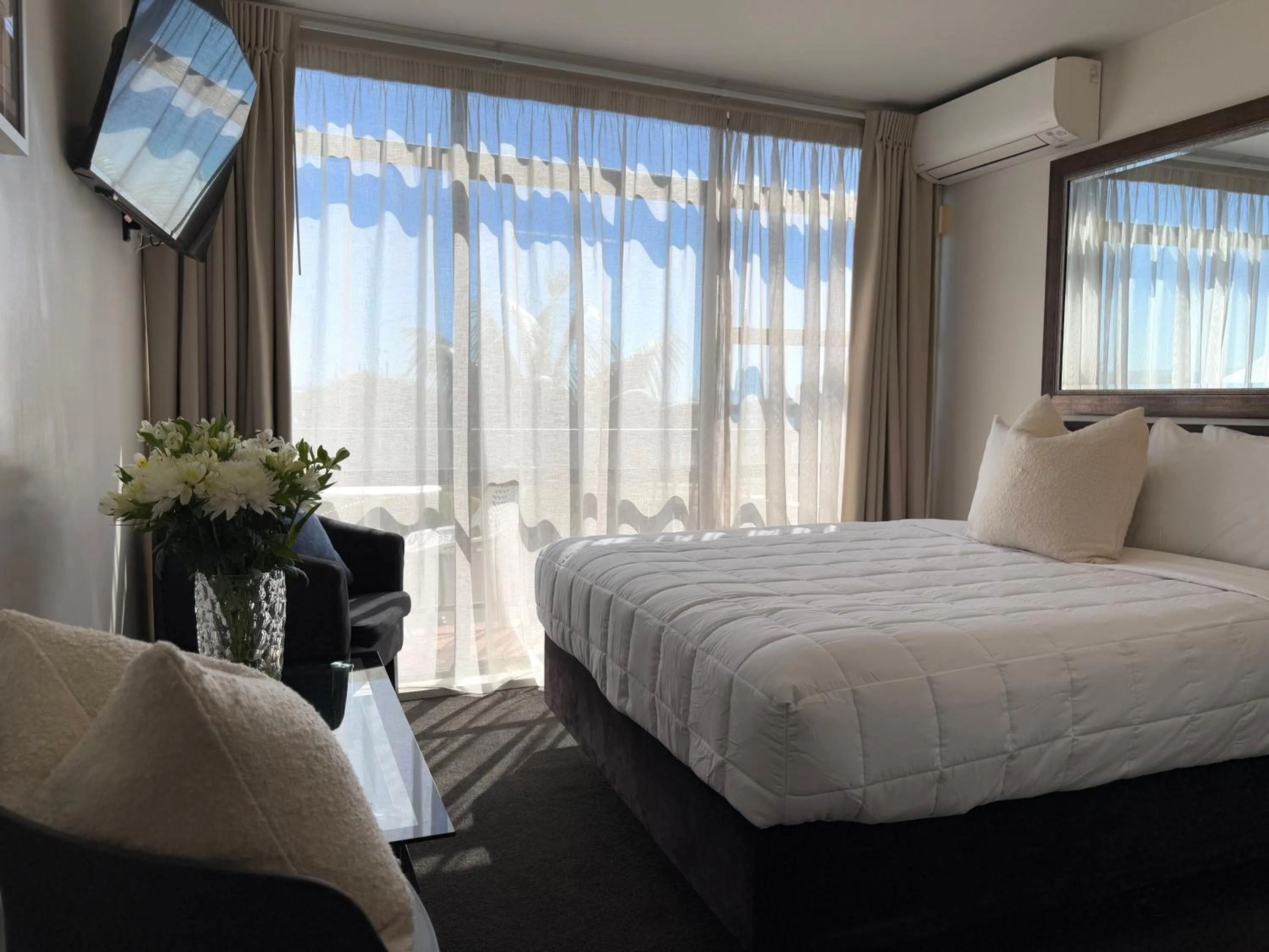 Bed in Bluewater Hotel