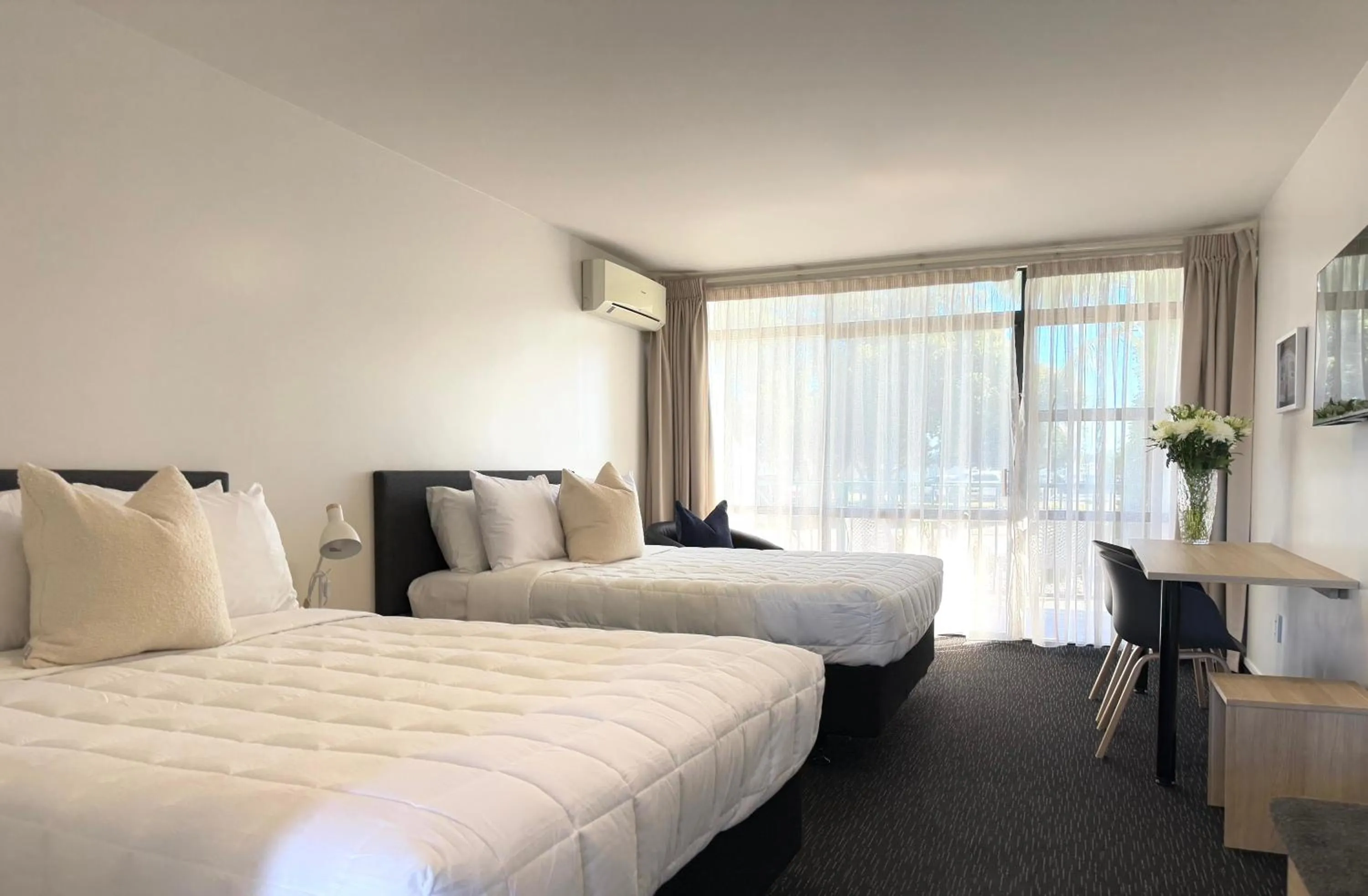 Bed in Bluewater Hotel