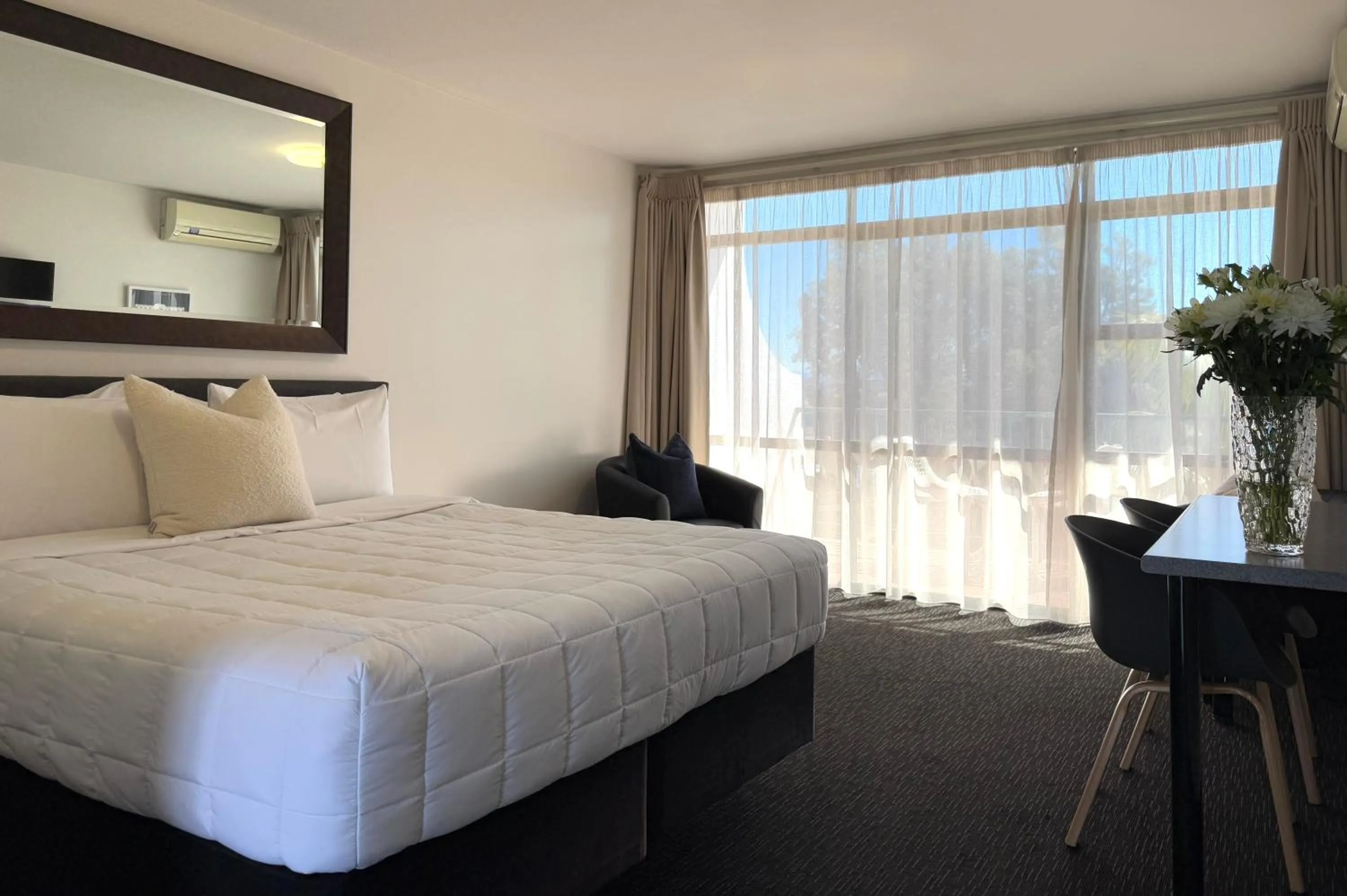 Bed in Bluewater Hotel