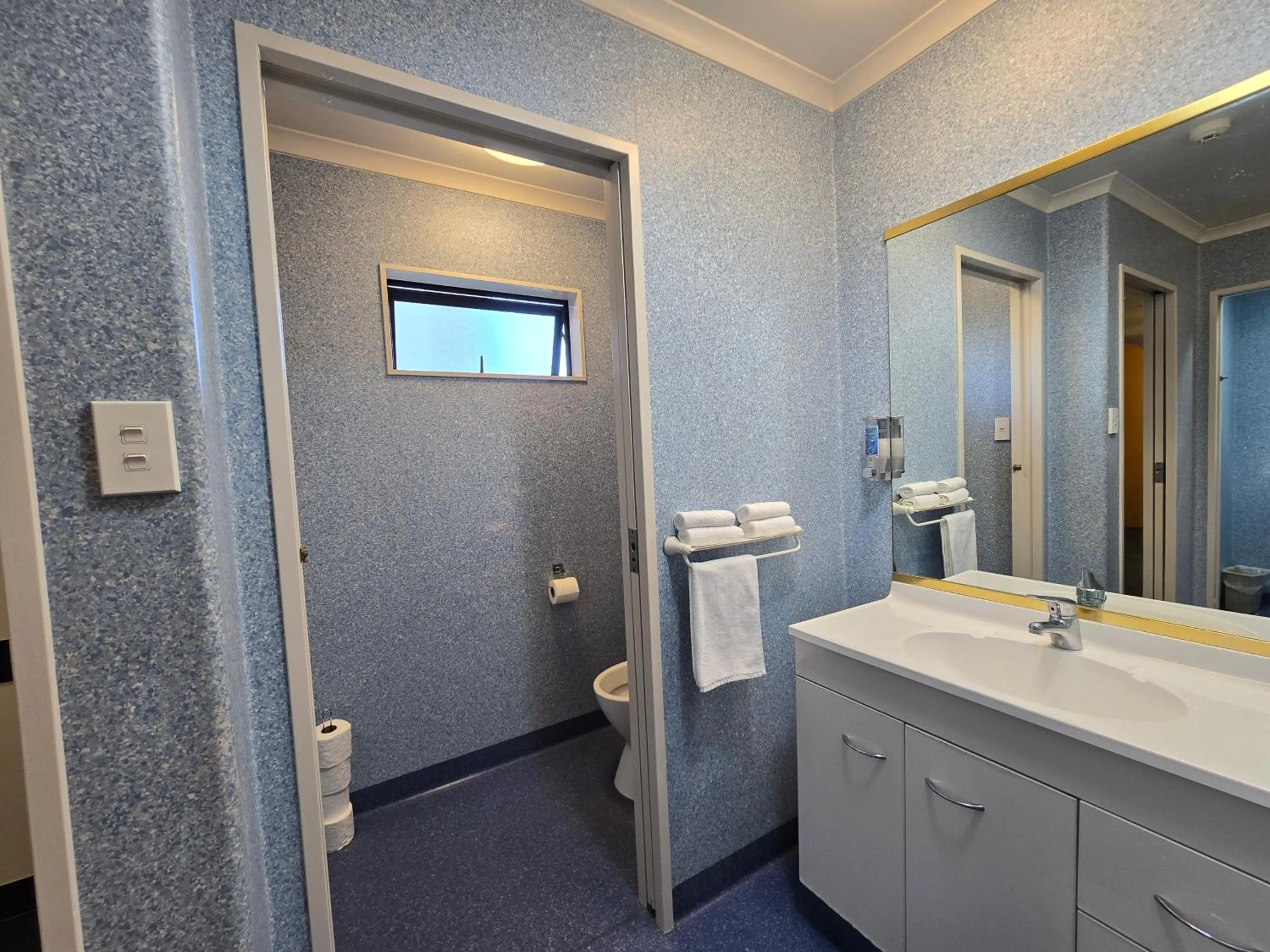 Toilet in Bluewater Hotel