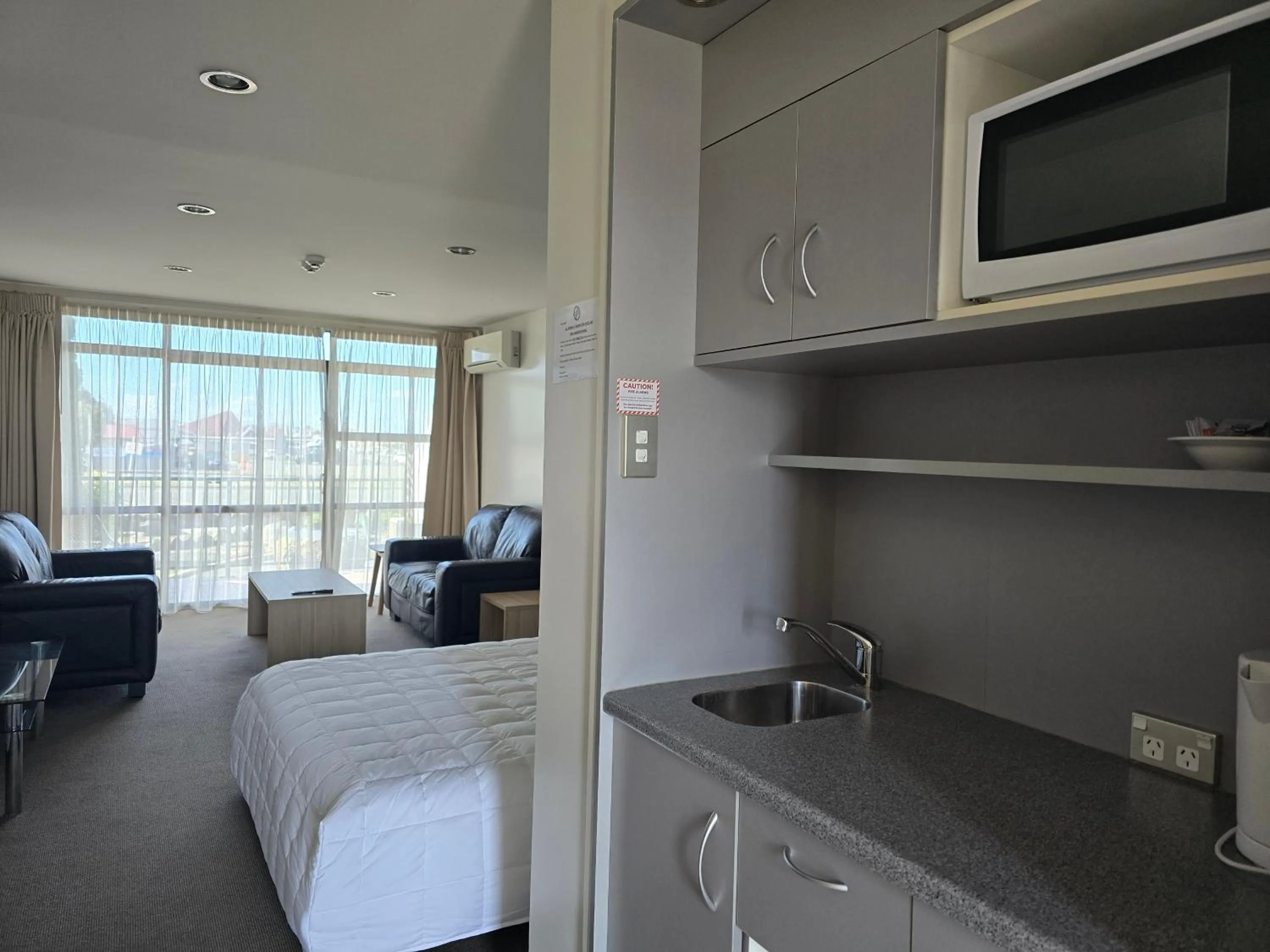 Bed in Bluewater Hotel