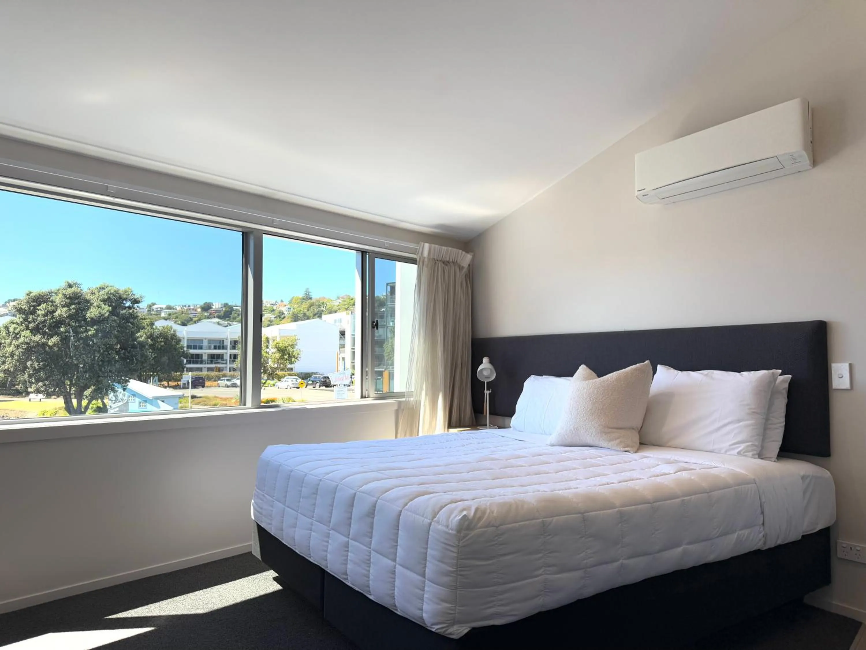 Bed in Bluewater Hotel