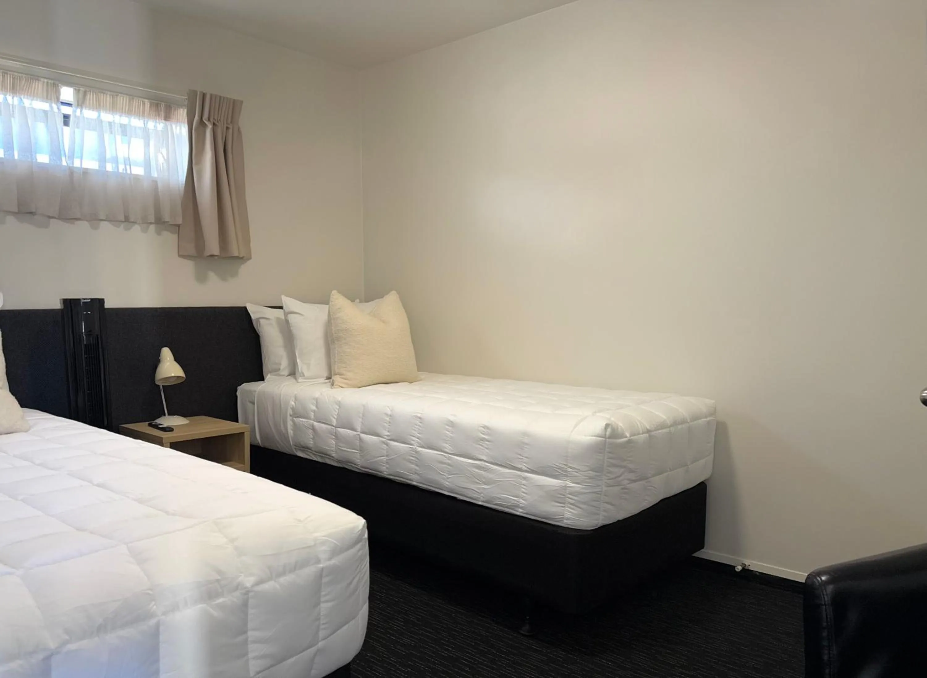 Bed in Bluewater Hotel