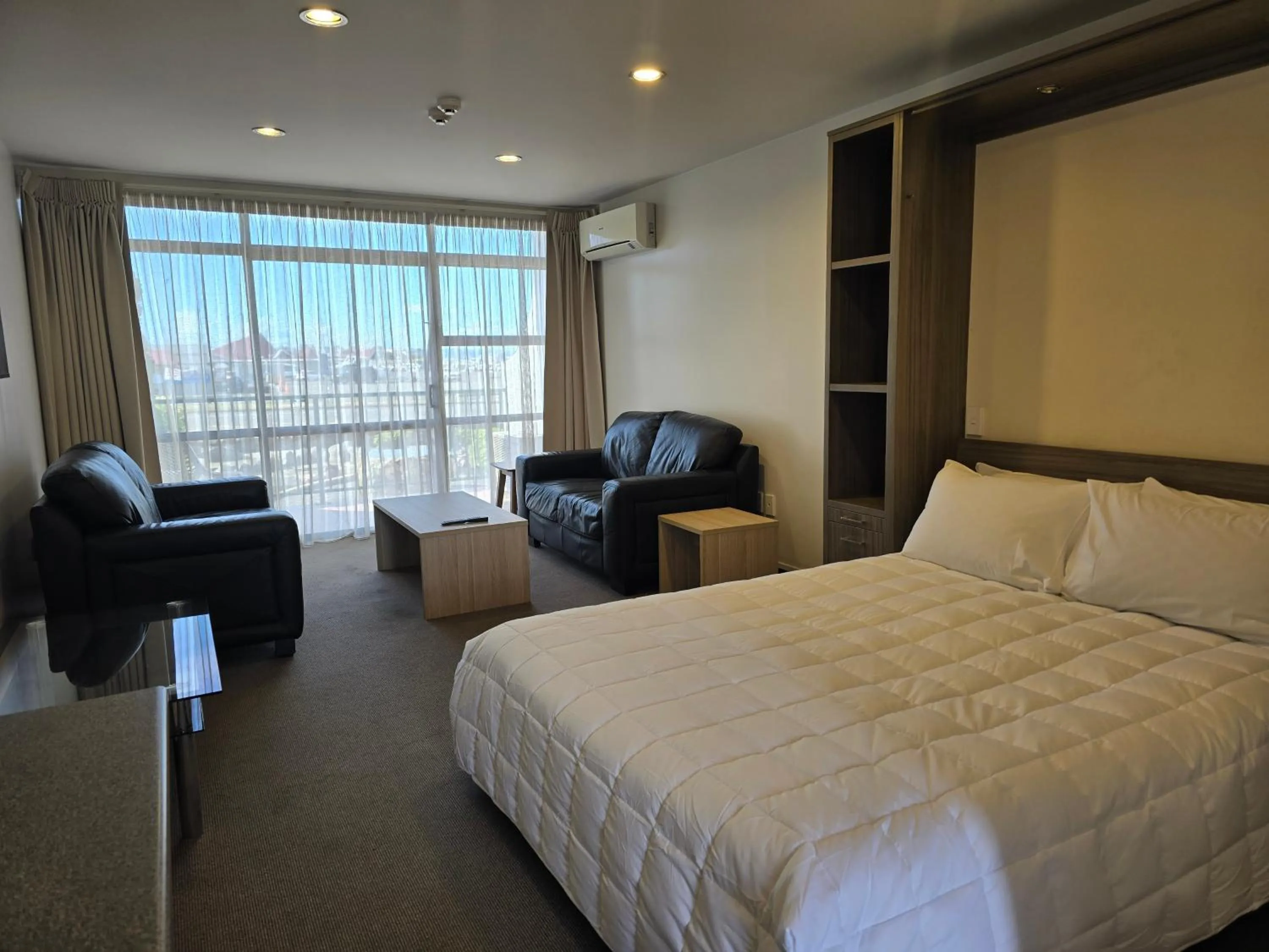 Bed in Bluewater Hotel