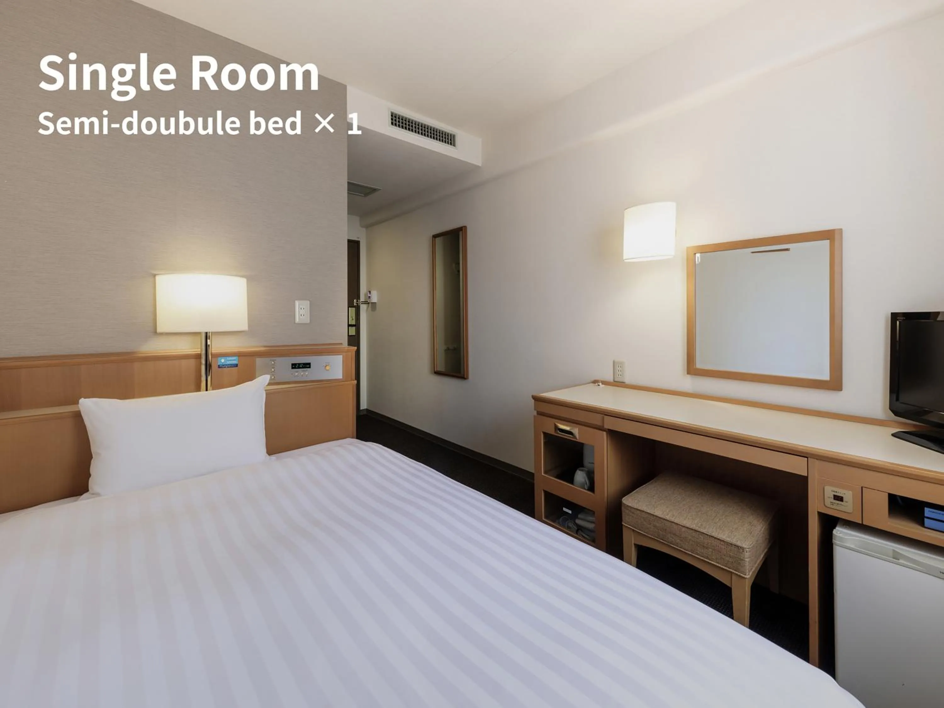 Photo of the whole room, Bed in Nishitetsu Inn Tenjin