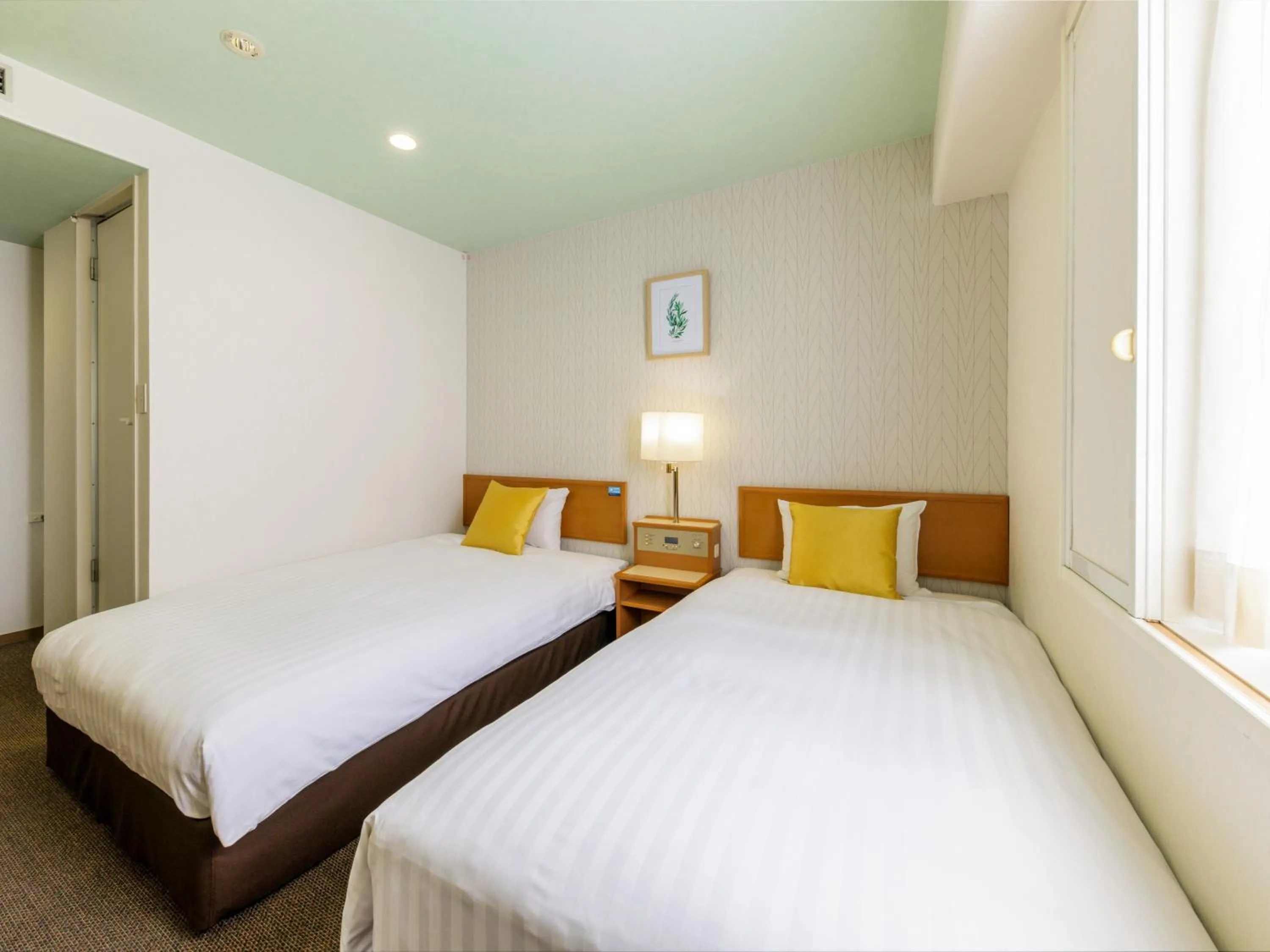 Photo of the whole room, Bed in Nishitetsu Inn Tenjin