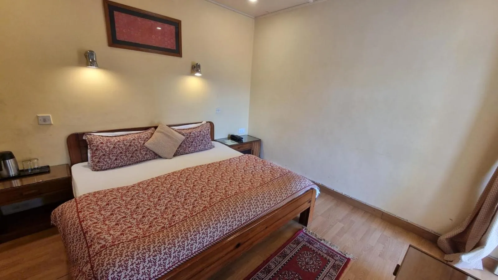 Bed in Hotel Padmini NIvas