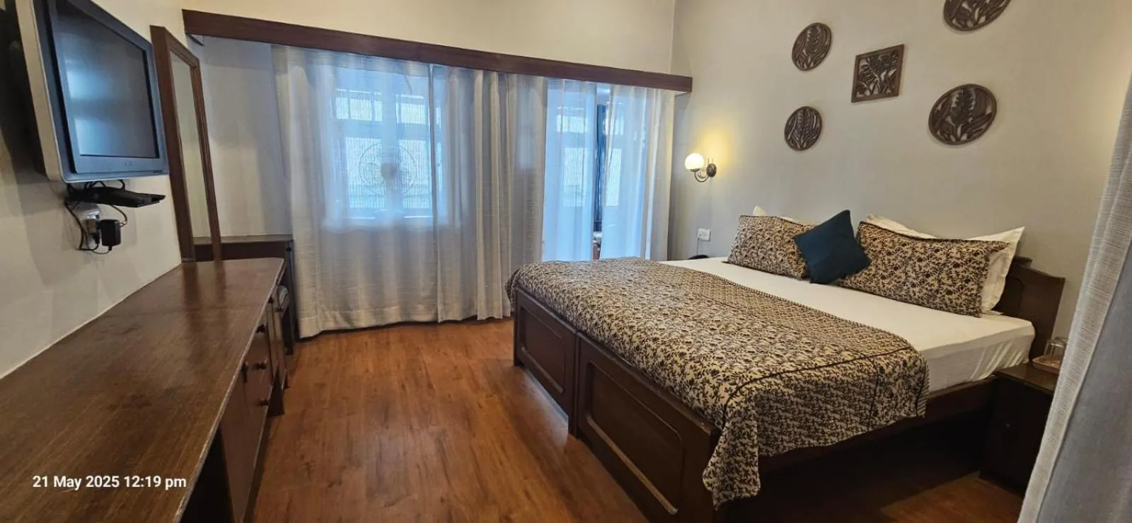 Bed in Hotel Padmini NIvas