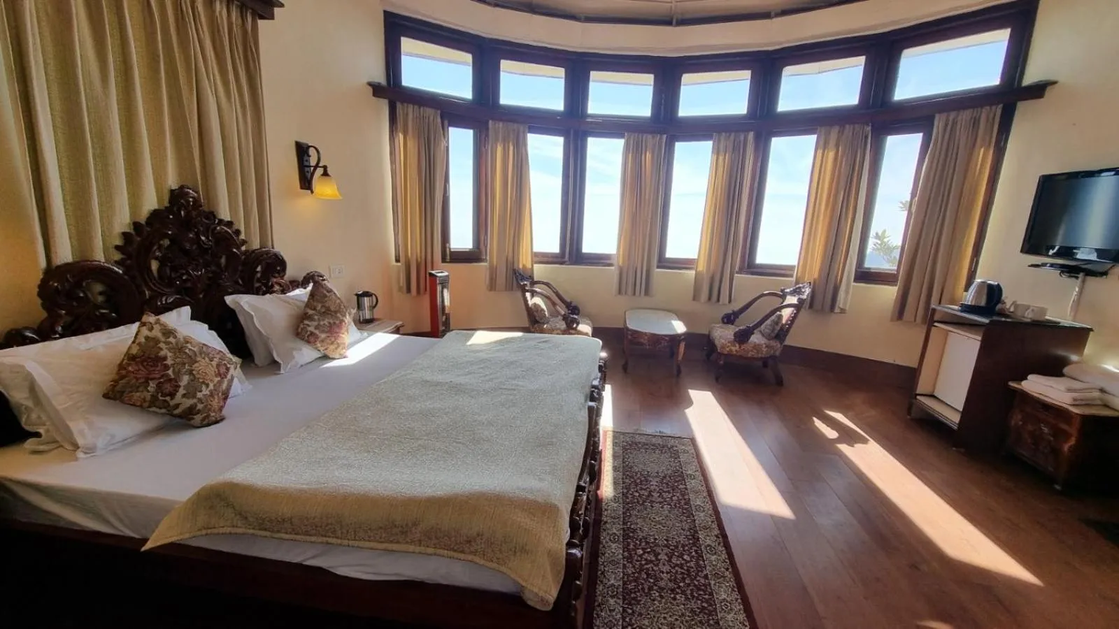 Bed in Hotel Padmini NIvas