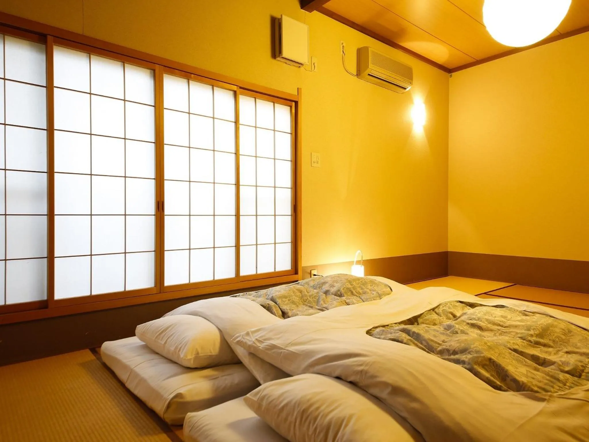 Bed in Ryokan Kutsuroginoya Yuu