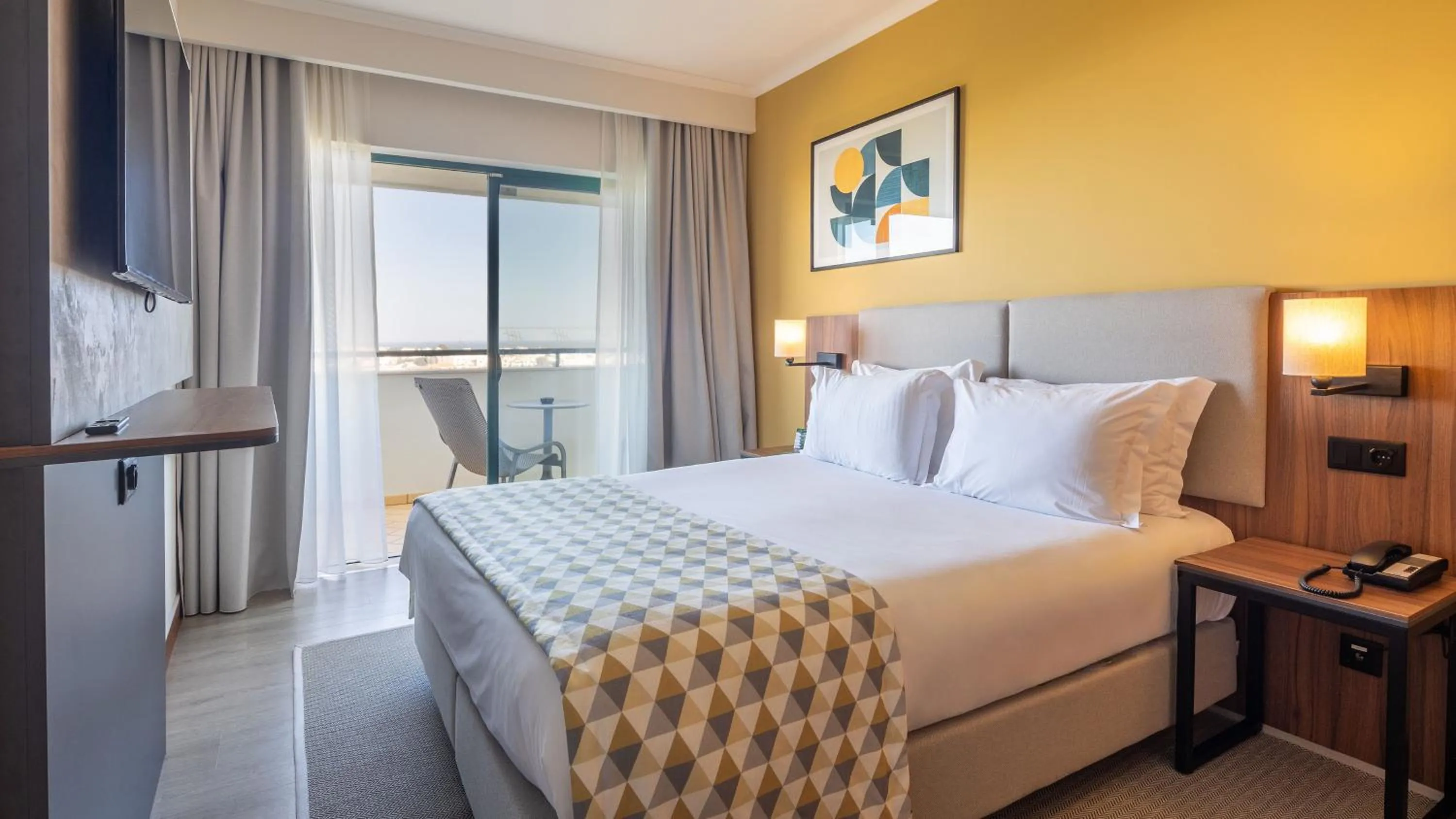 Photo of the whole room, Bed in Holiday Inn Algarve Albufeira by IHG