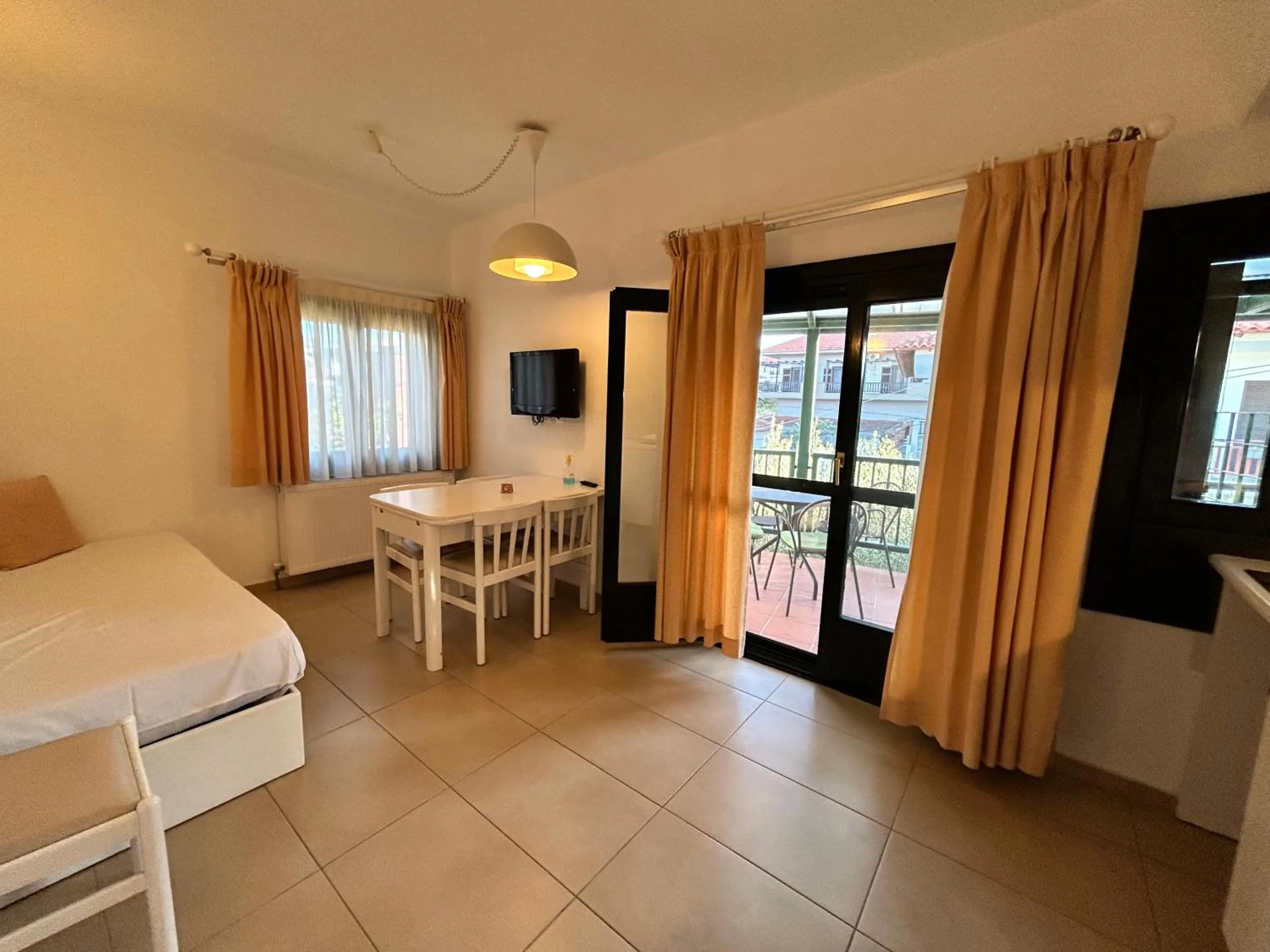 Dining area, Bed in Elia Apartments