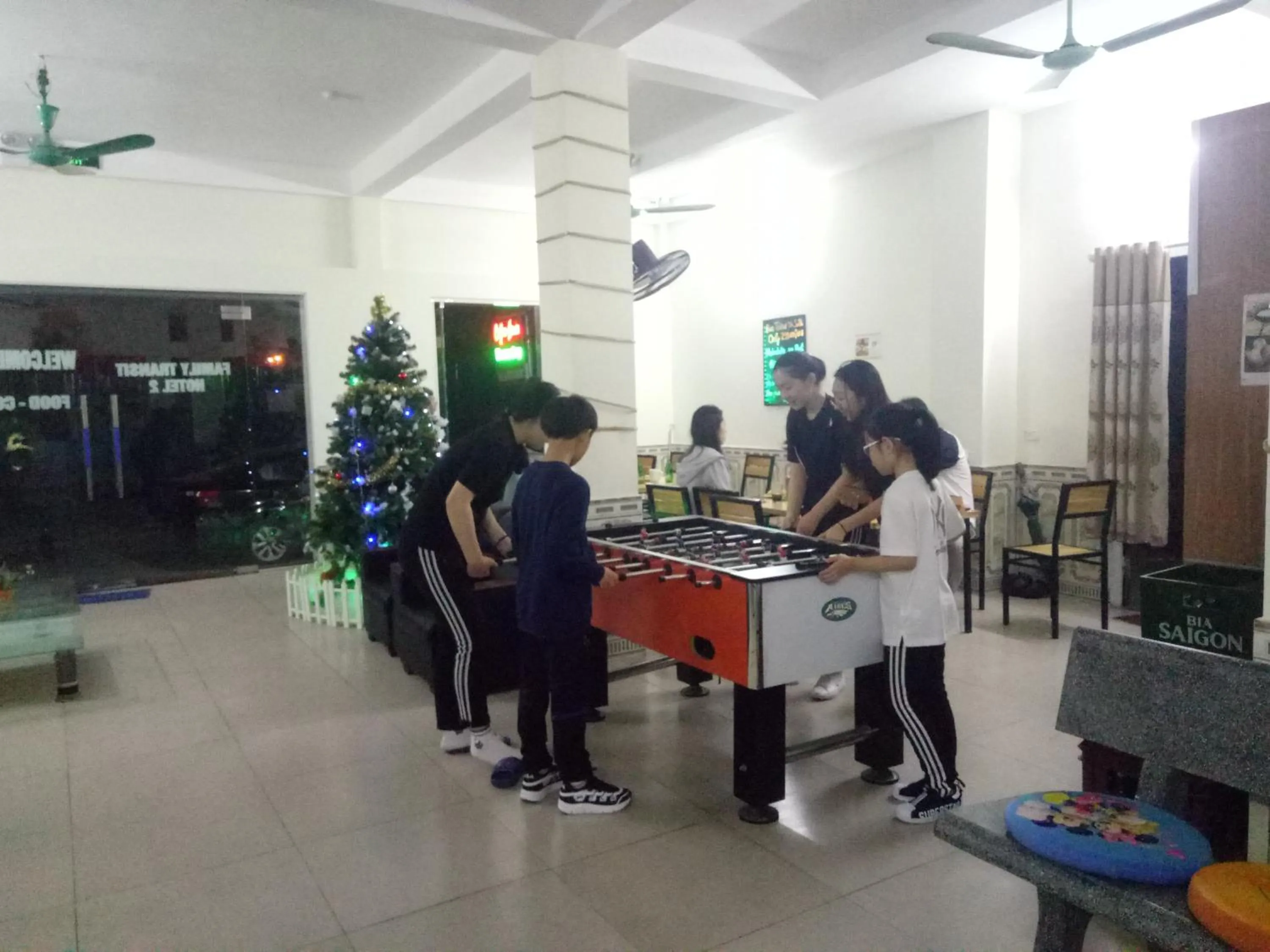 People in Family Transit 2 Hotel