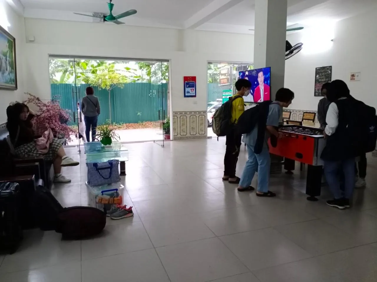 People in Family Transit 2 Hotel