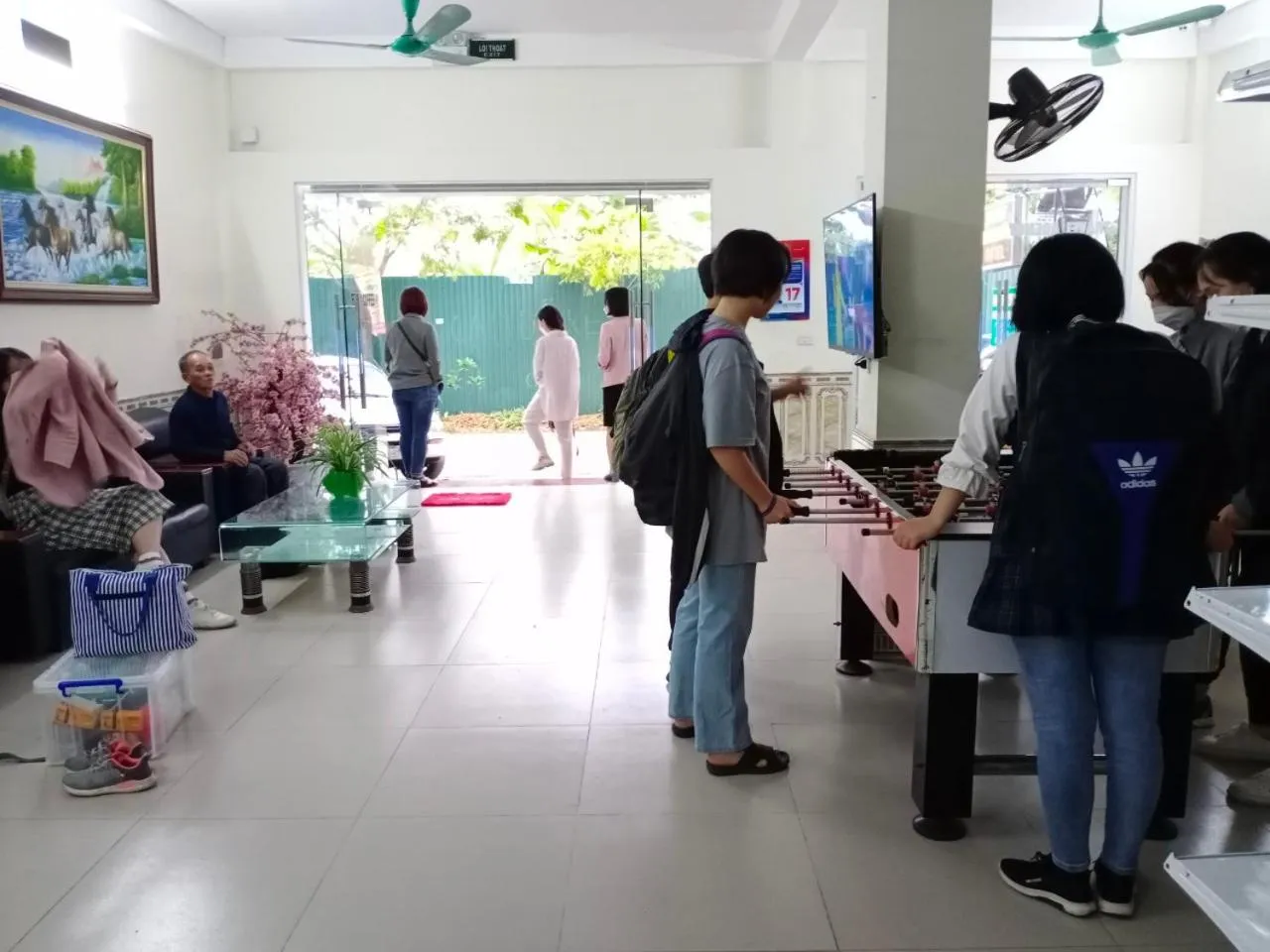 People in Family Transit 2 Hotel