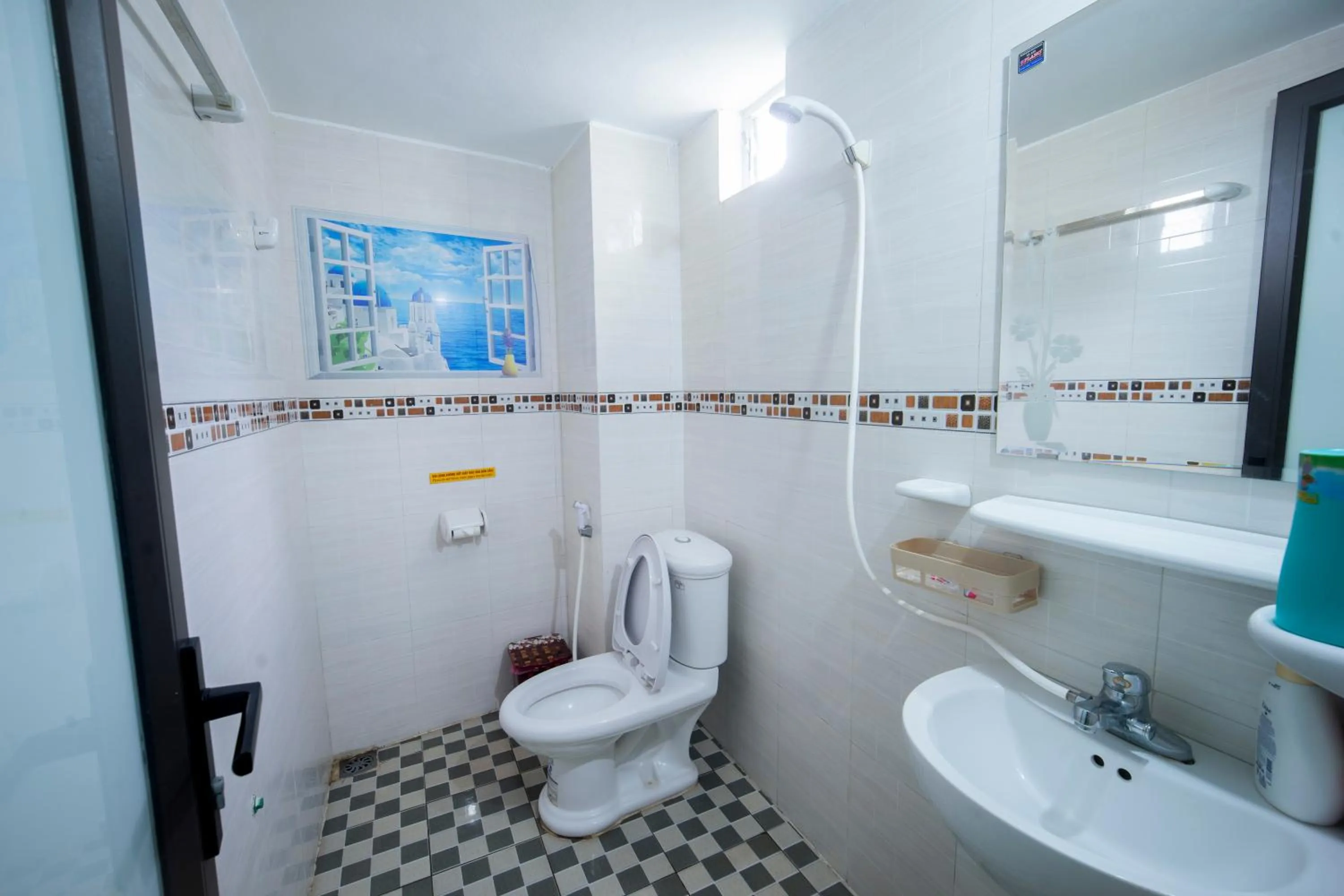 Toilet in Family Transit 2 Hotel