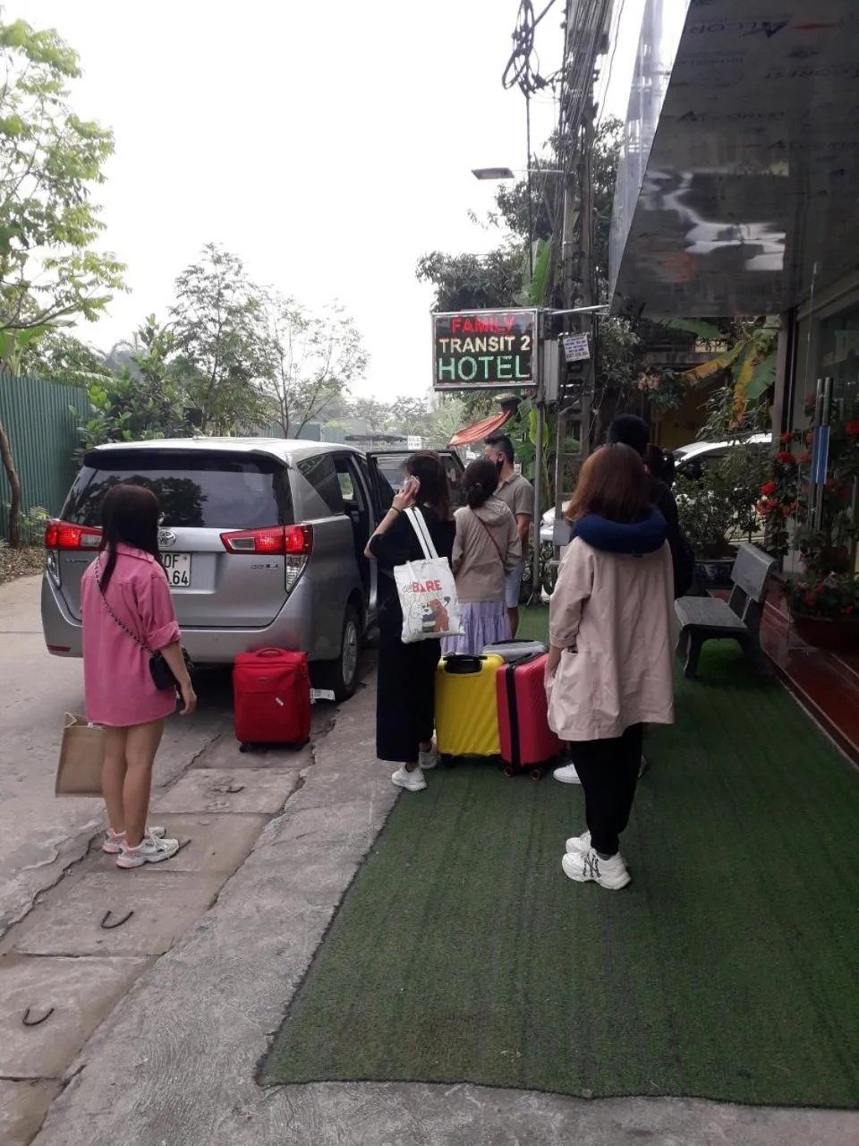 People in Family Transit 2 Hotel